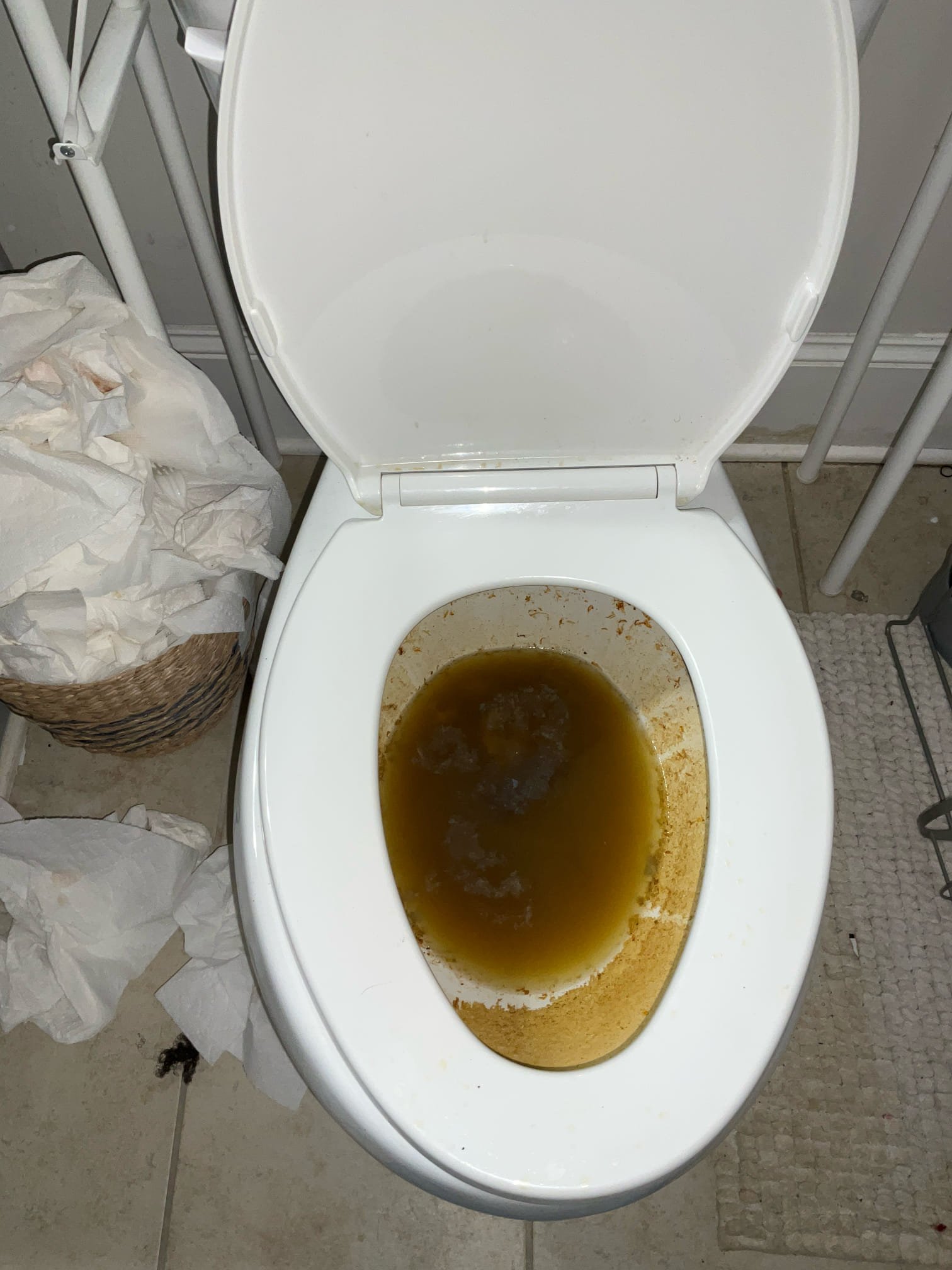 Customer had a toilet backing up on the main floor bathroom. Stoppage appeared to topically be a waste and paper stoppage. Ran the auger after customer approved work. Pulled rags out of the toilet trap to clear the stoppage. Tested toilet to ensure proper flush. 