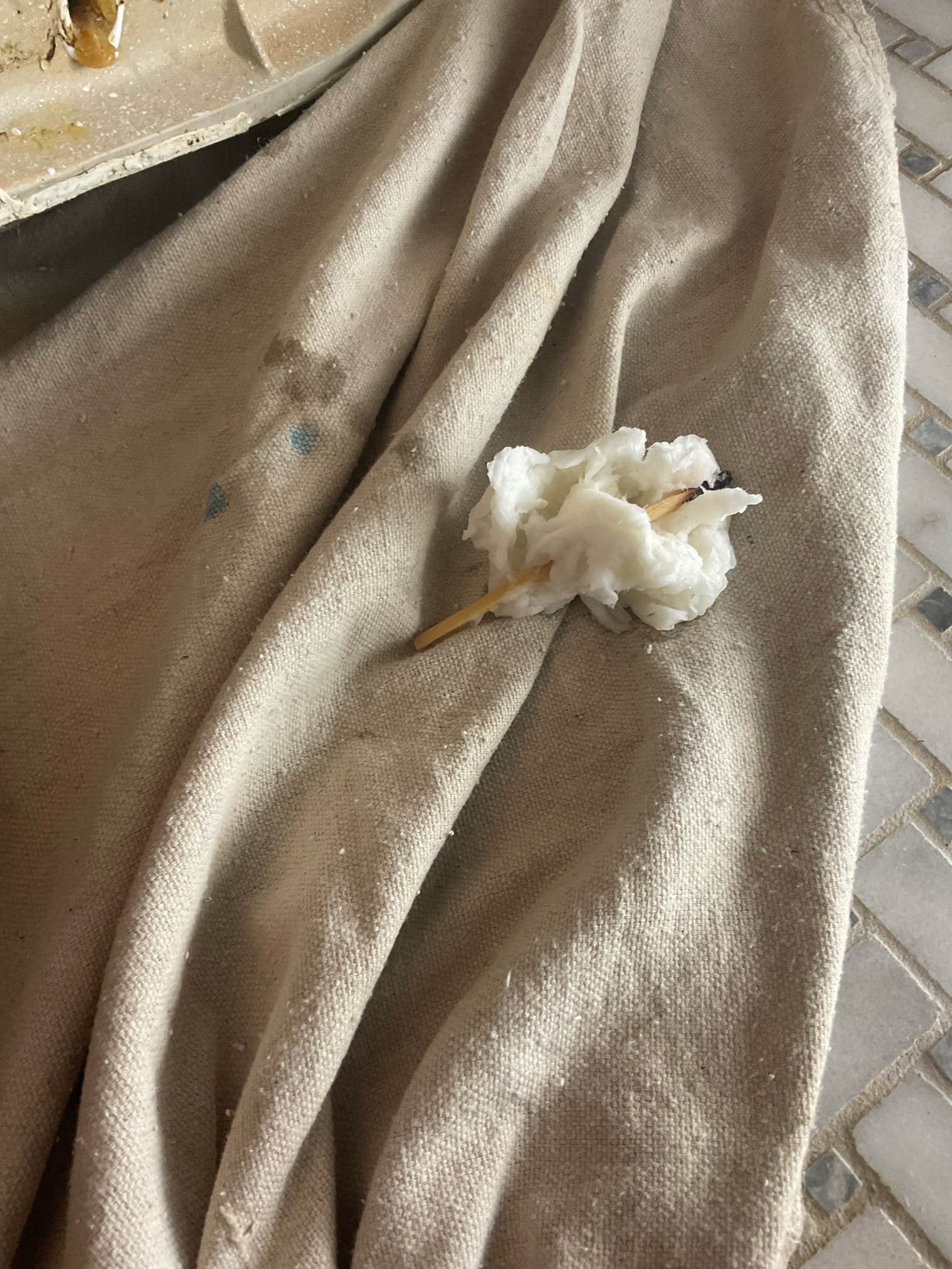 Pull and reset master corner shape toilet , manually removed a long match was stucked inside the toilet bowl , pull toilet back with new wax , closet bolts , supply line . 