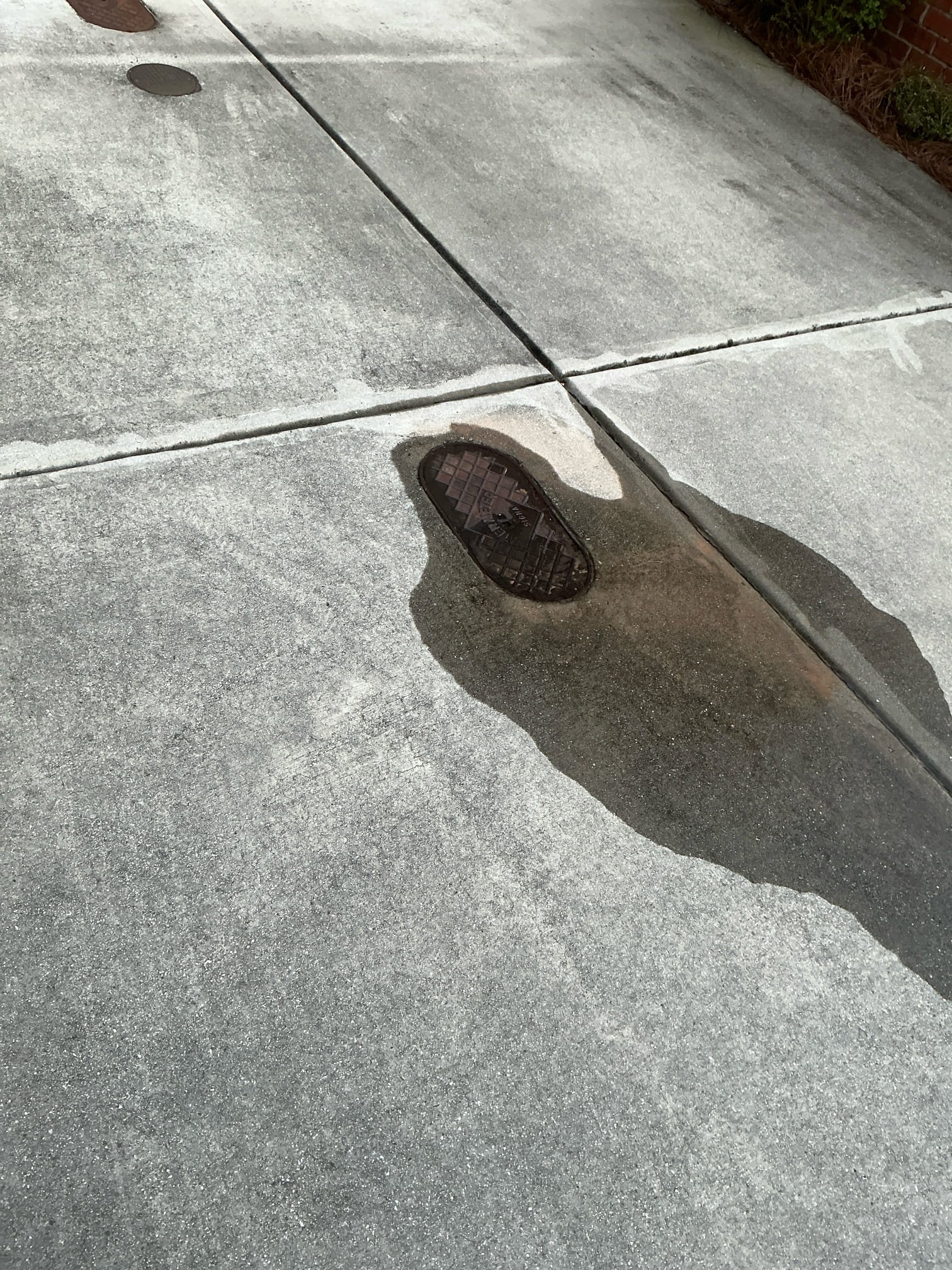 Client called us out due to a leak on their main water line under the concrete driveway. Client has 2 water shutoff boxes in their driveway, which is odd because most of the rest of the neighborhood only has 1. Sewer and water line seem to be running right on top of each other. The leak appears to be in between the 2 boxes, as they both are taking on water from the leak, but the downhill box is filling up way faster than the one by garage and can see the water flowing in from the front of that downhill box when water is pumped out. Gave estimate to bust up concrete and repair the leaking water line. 

Waived service fee.