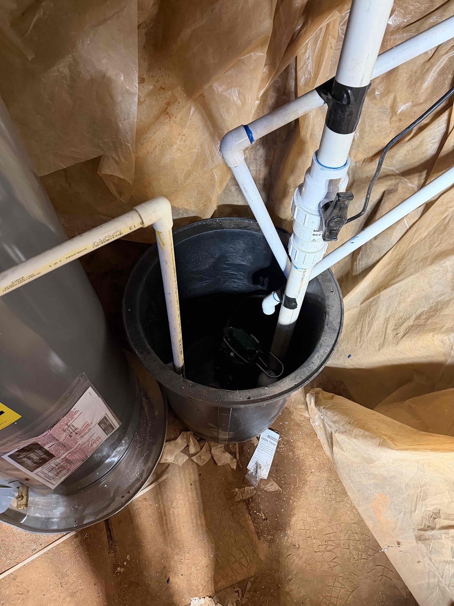 Remove existing water heater and haul away. Furnish and install new 50 gallon gas water heater with new tank shut off and thermal expansion tank with bracket. Also install drip pan under heater.
In crawl space install sump pump with basin. Run vent and discharge.

Installed new water heater, and new basin and sump pump in crawlspace. Also installed new PRV. Tested all work and no leaks were present at this time and everything was working as it should.

PRV was replaced and water pressure is low. Stated to customer that main waterline may be galvanized, which is restricting water. Will send estimate for new water line.