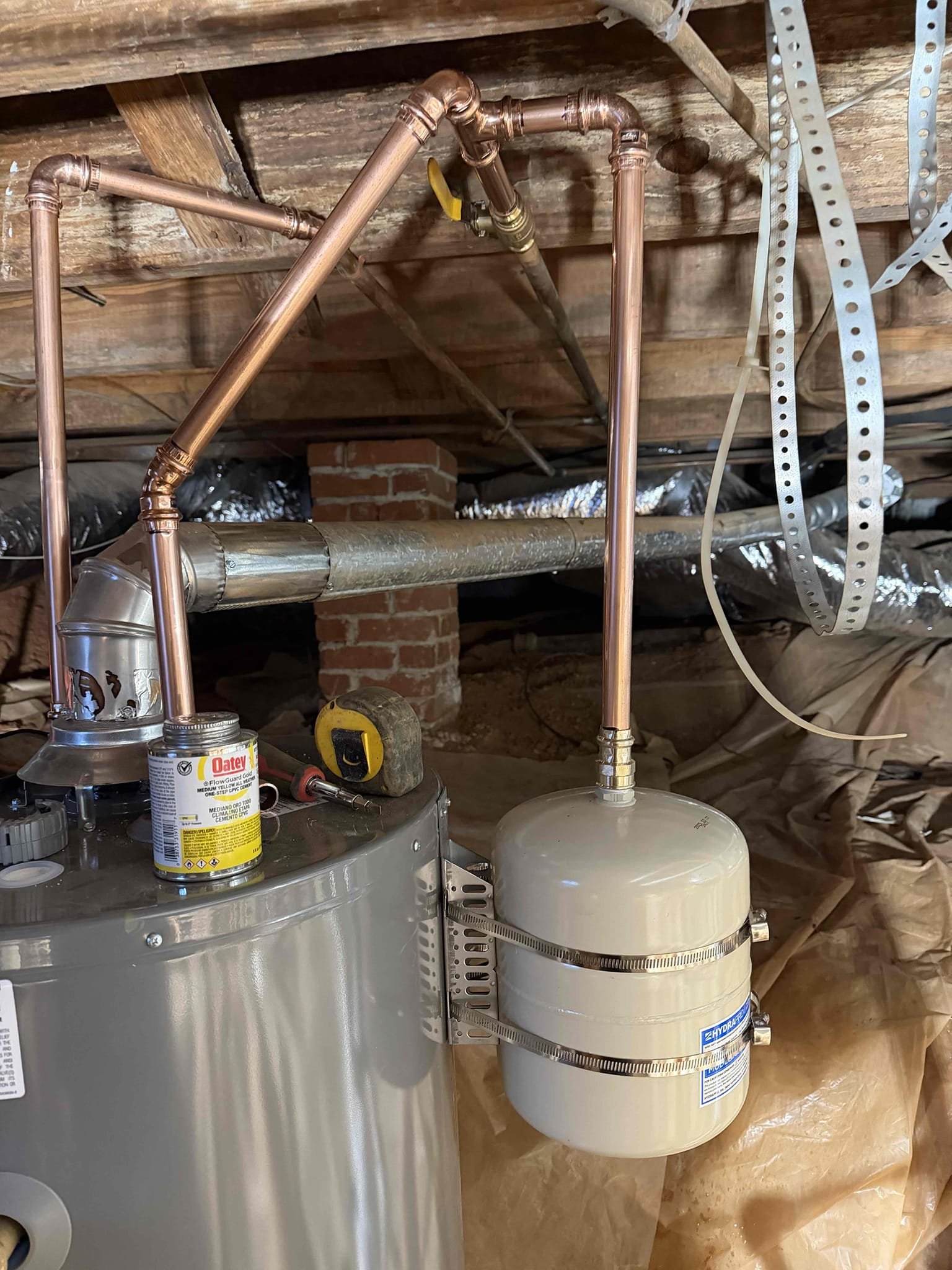 Remove existing water heater and haul away. Furnish and install new 50 gallon gas water heater with new tank shut off and thermal expansion tank with bracket. Also install drip pan under heater.
In crawl space install sump pump with basin. Run vent and discharge.

Installed new water heater, and new basin and sump pump in crawlspace. Also installed new PRV. Tested all work and no leaks were present at this time and everything was working as it should.

PRV was replaced and water pressure is low. Stated to customer that main waterline may be galvanized, which is restricting water. Will send estimate for new water line.