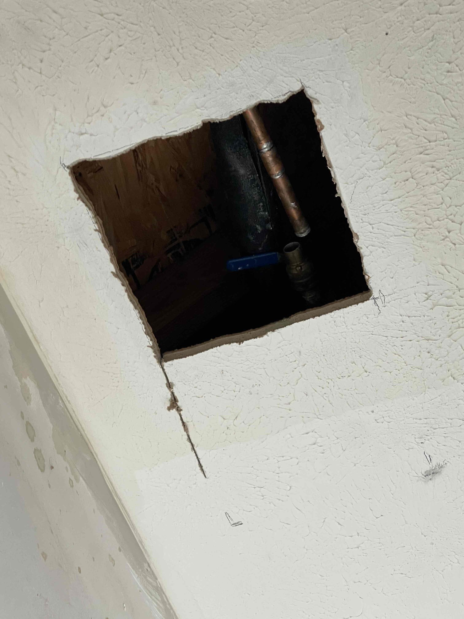 No warranty to freeze damage or for high pressure! Solder join in ball valve froze and broke apart. Caused a lot of drywall to come down in the garage. We cut out leaking valve and repipe section. Tested to ensure proper function and a leak free installation. Water pressure to home is 135 psi. Left quote to replace water heater and PRV. 