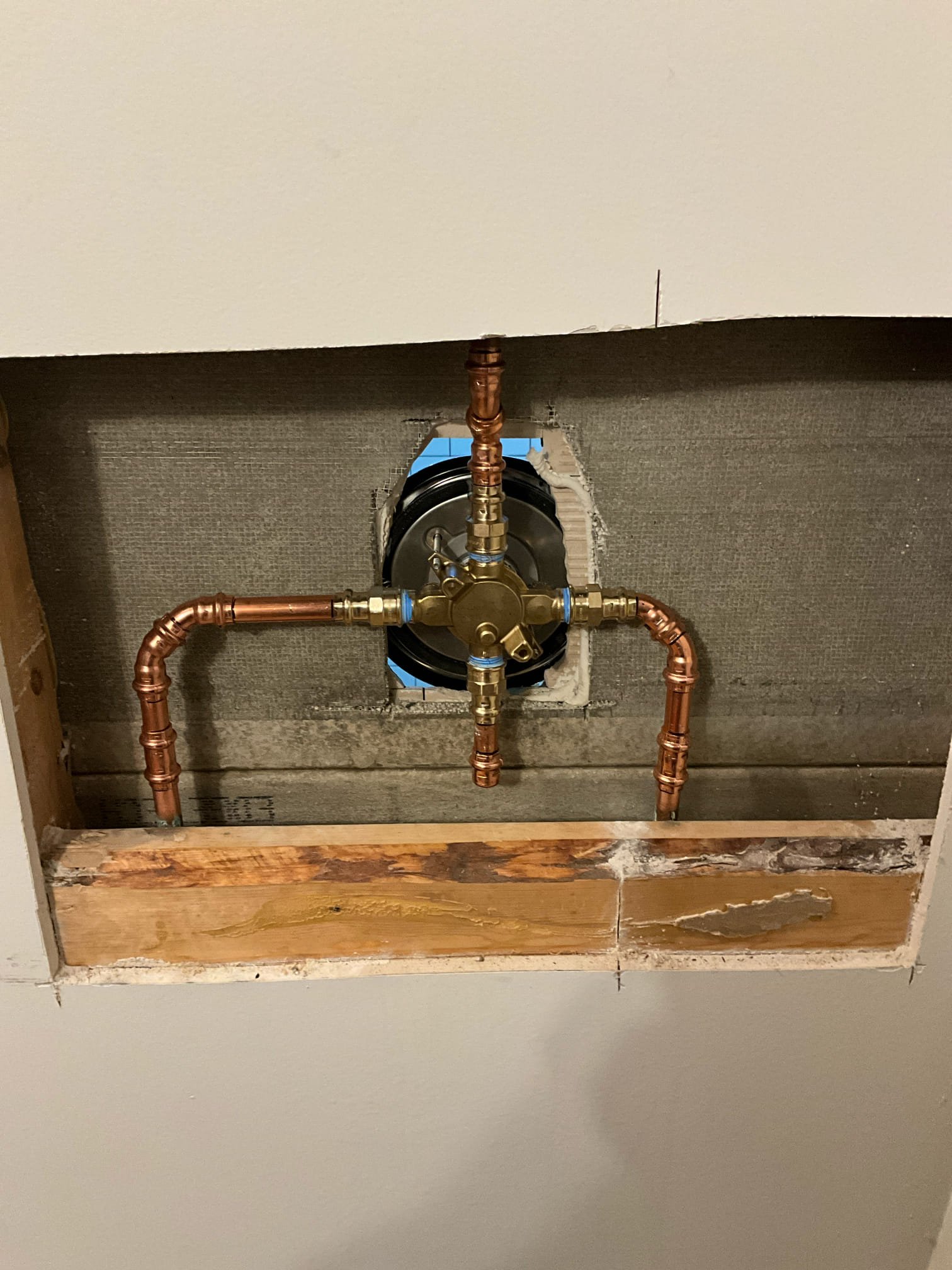 Returned and installed customer supplied shower valve and trim. Also provided and installed new 50 gallon gas heater in the basement. Installed a new thermal expansion tank, drip pan, and shutoff. Customer requested not putting a repair plate to cover the hole behind the sinew shower valve. Customer wants to do the tile differently. Asked for a heavy silicone seal as a temporary stop gap until the tile can be done. Tested all work to ensure proper function and no leaks. None were found. Shower needs 24 hours to dry. The water heater doesn’t see, to be venting well. Checked the branch line for the heater itself and it has positive slope. Recommended having an hvac company check the larger diameter venting for any possible obstruction or slope issue.