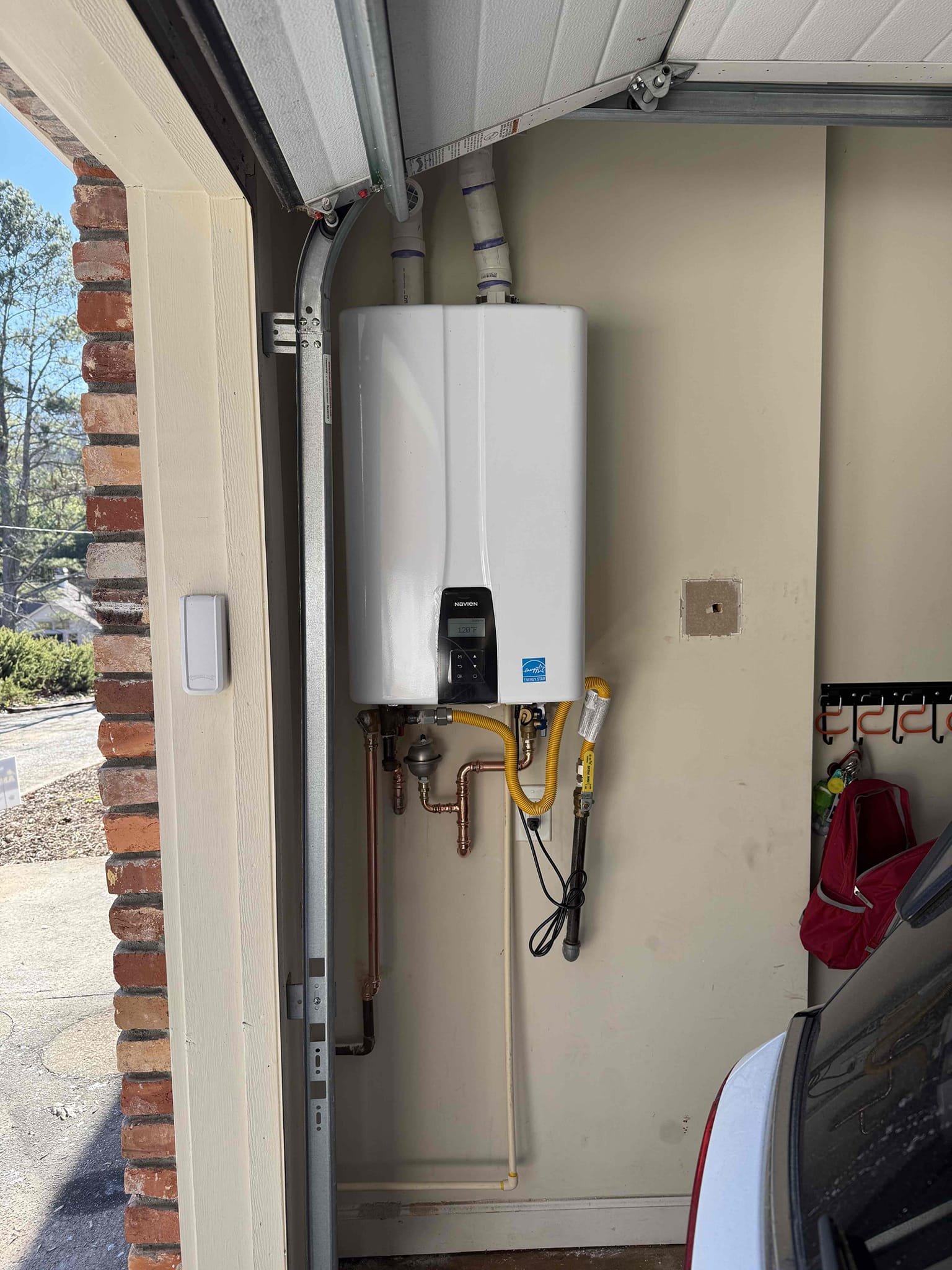 Returned to install navien 240a2 tankless with new service ports and new expansion tank. Installed the new tankless and reworked vent and gas. Turned water and gas back on to check for leaks, found no leaks. Tankless is producing hot water. Tankless is working properly and no leaks upon departure 