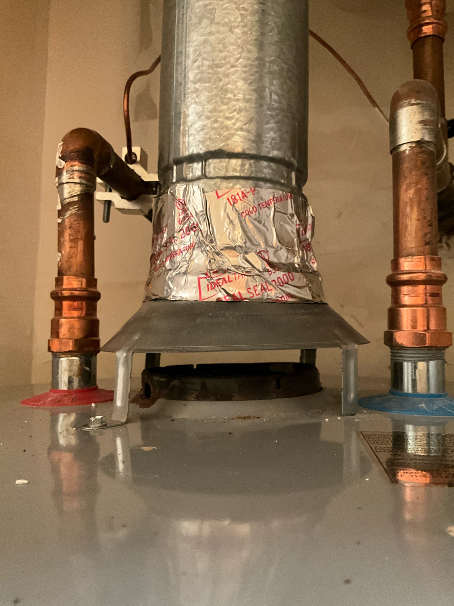 Call for no hot water after recent vent work.

Mr. English states that water heater shut off and continues to shut off after relighting since work was complete. He called AO smith and they advised that the gap around the draft hood was part of the problem. The gap in question is part of the double wall vent. He stated AO smith also states that the problem here is the draft hood, and stated that it must be a specific model of draft hood.

I replaced draft hood with another model draft hood and lit water heater. It went out after a few minutes and tripped the FV switch. Mr. English states that he has had to press the block button each time to reset before the unit would light. 

Water heater is from 2018. Two years ago the vent was attached directly to the top of the water heater when contractors were performing roof repairs. Two days ago I installed a draft hood. We did not turn the unit off or otherwise adjust any settings. 

I attempted to perform fv reset via dial control reset and c