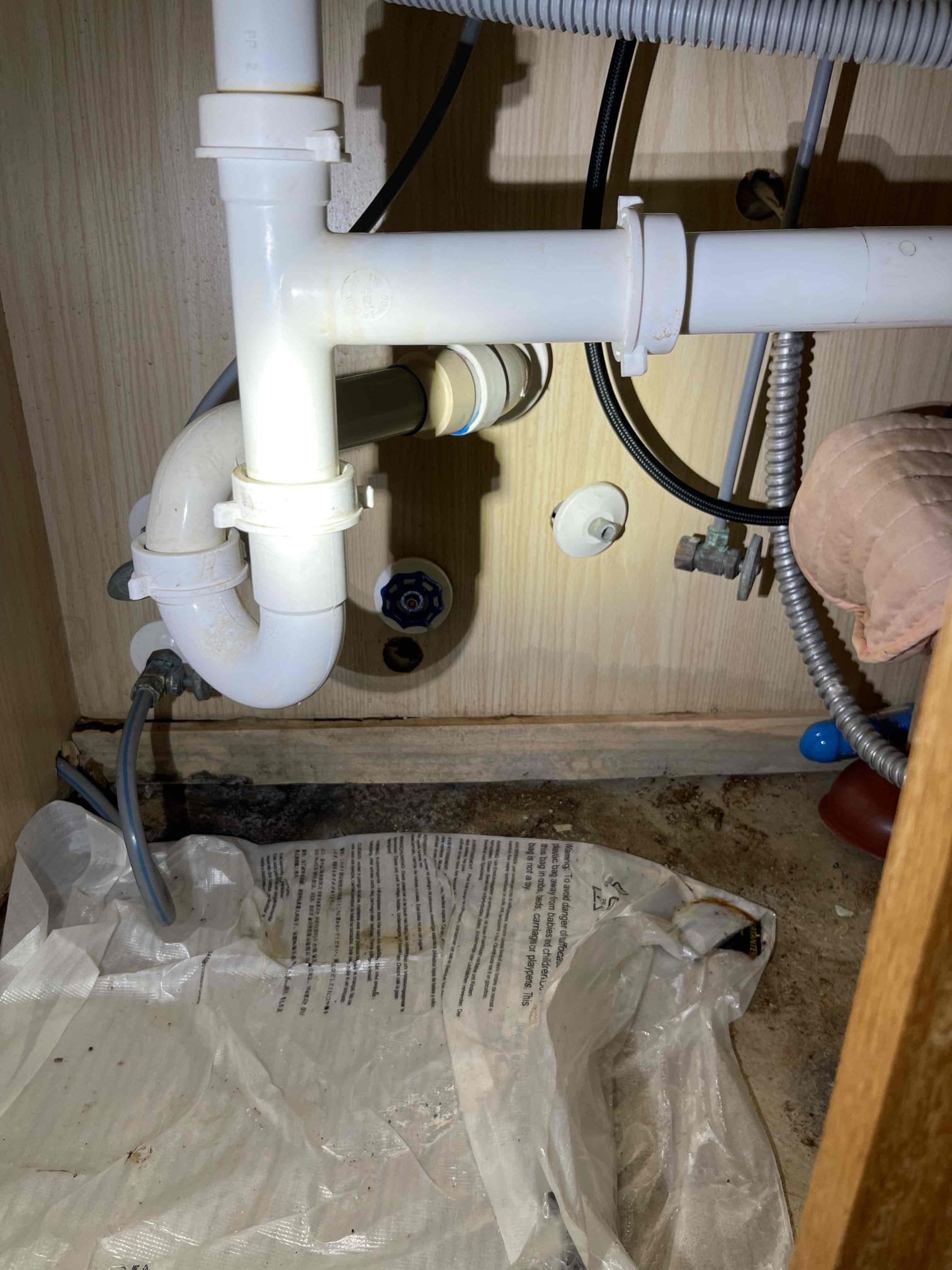 Stop valve on polybutylene line blew off and flooded kitchen. House is vacant. Customer elected to just replace the one valve even though other valves under sink are same incorrect compression style on polybutylene. Replace stop valve and ensured no leaks. Water pressure tested at 100 psi. Left quote for regulator replacement but will take cutting drywall or removing water heater to access the PRV. Toilet in hall bathroom making loud noise from fill valve. Left quote to rebuild toilet. House is a slab home that has been partially repipe but there is still a lot of polybutylene lines running under the slab. Left quote to repipe the whole house. Left water off at meter at home owners request so she does t have to keep the house heated while it is vacant.