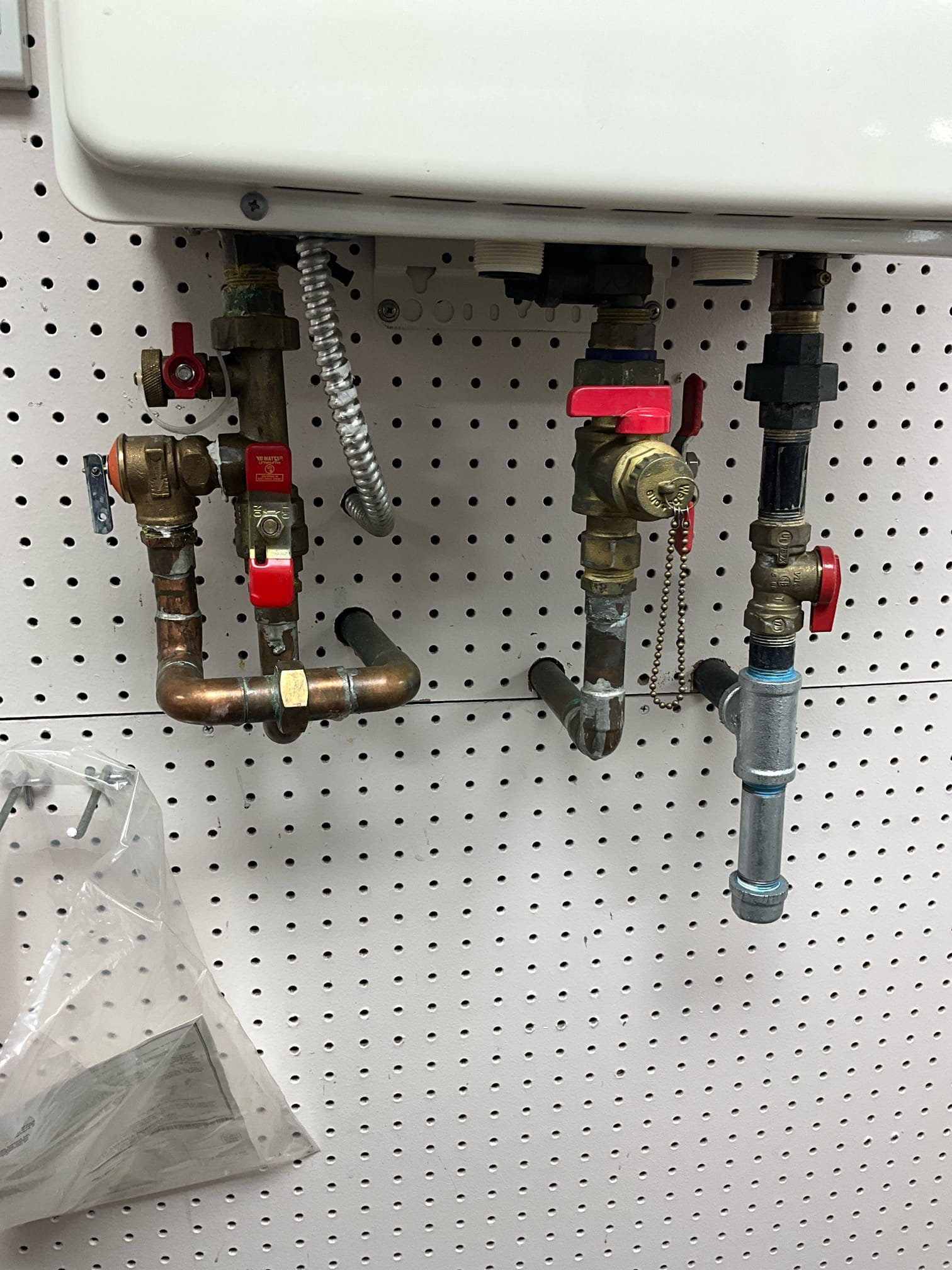 Customer has a Noritz water heater that is around 20 years old and has a code 16. Customer had initially requested to flush the tankless. This service was declined due to the age of the unit. Left a price to reroute the exhaust line because the current one is exhausting under a porch and this isn’t allowed by code or manufacturer specifications. 