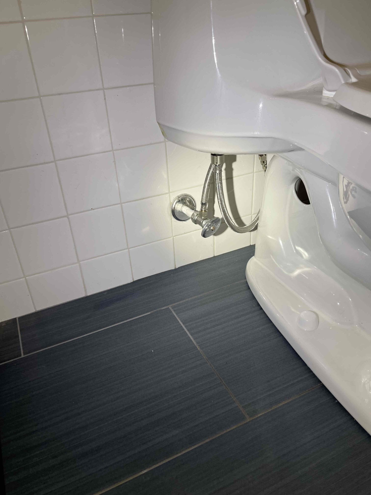 Downstairs toilet was loose and moving back and forth. Received approval to pull toilet and replace wax ring. Installed new wax gasket and closet bolts. Reinstalled toilet. After reinstalling we found old supply line was leaking and fill valve was 90% inoperable. We replaced both. No further issue at this time.