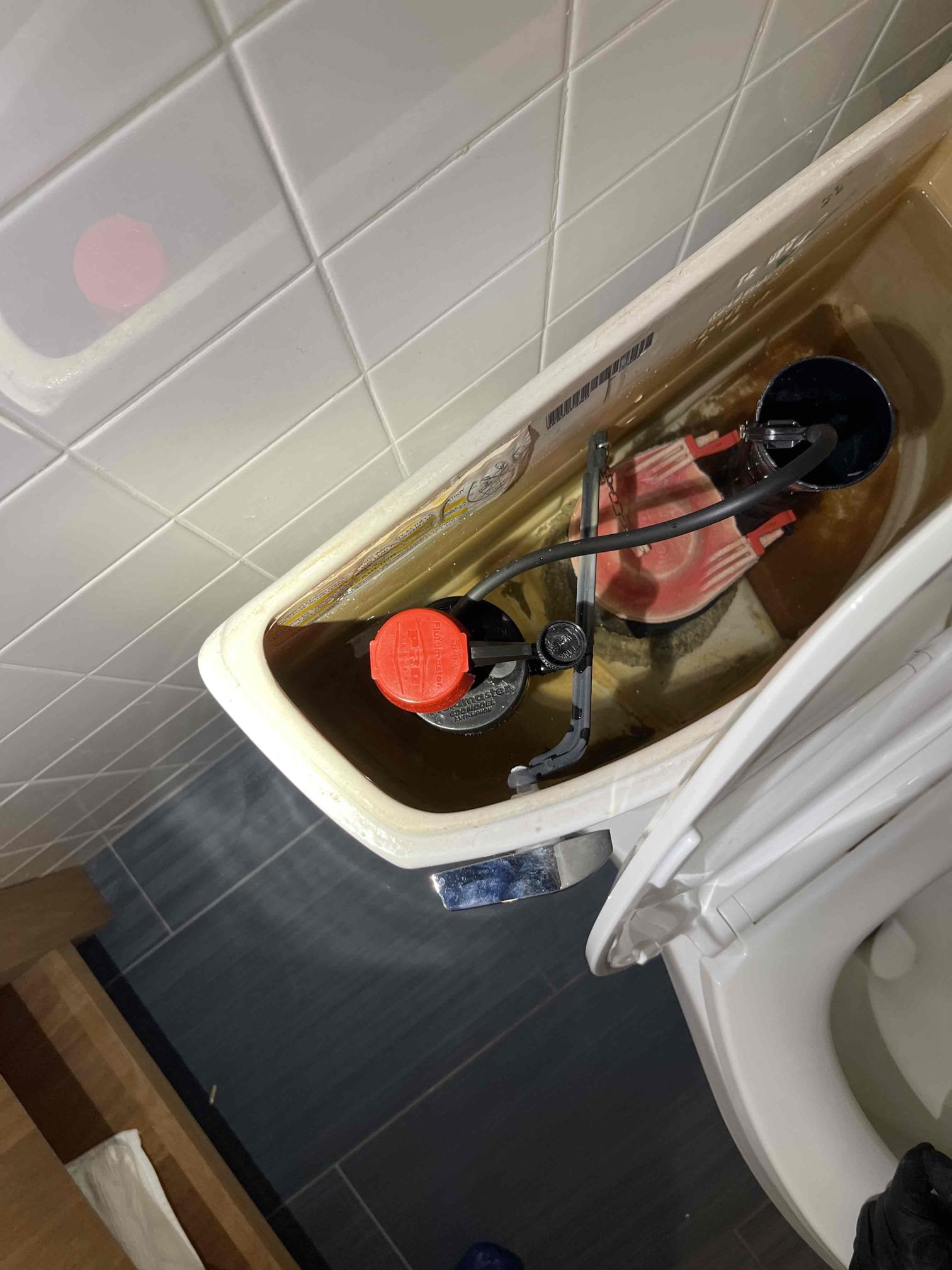Downstairs toilet was loose and moving back and forth. Received approval to pull toilet and replace wax ring. Installed new wax gasket and closet bolts. Reinstalled toilet. After reinstalling we found old supply line was leaking and fill valve was 90% inoperable. We replaced both. No further issue at this time.