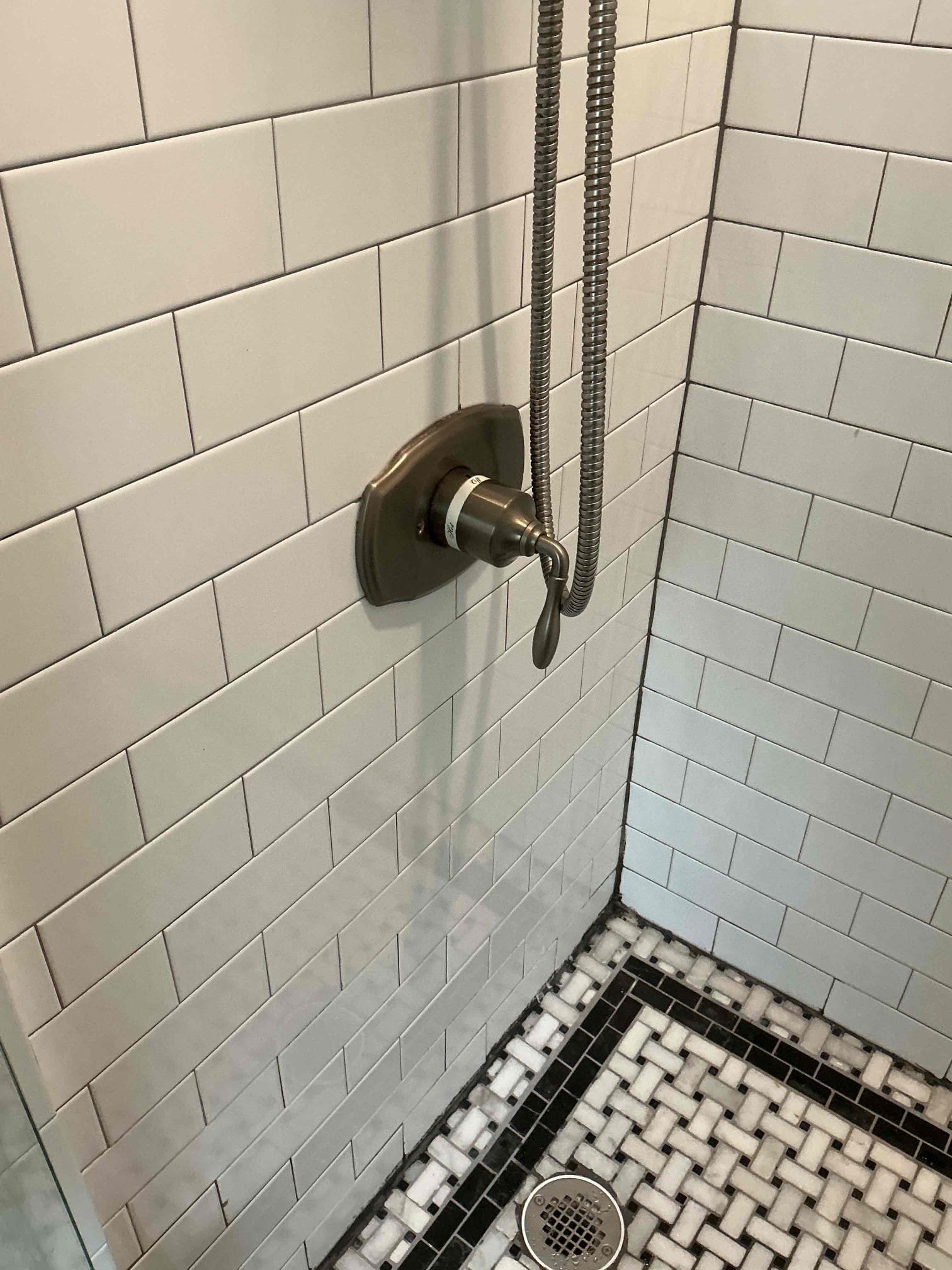 Customer had issue in drainage system when toilet in master was flushed, Large gurgling sound come from studor vent under kitchen sink. in attempt to fix issue, replaced Studer vent. Reflush toilet, but found issue not fixed. Put back old studor.  Later looked outside to find a clean out. removed clean out and large amount of water came out. Cleanout seems to be between inlet of septic tank and Leech filed line. Gave customer option to camera to see if we could further address issue. Also repaired shower handle in master bath. Customer wanted to have septic tank company come out to address issue. Also explain to customer about flush for tankless water heater.