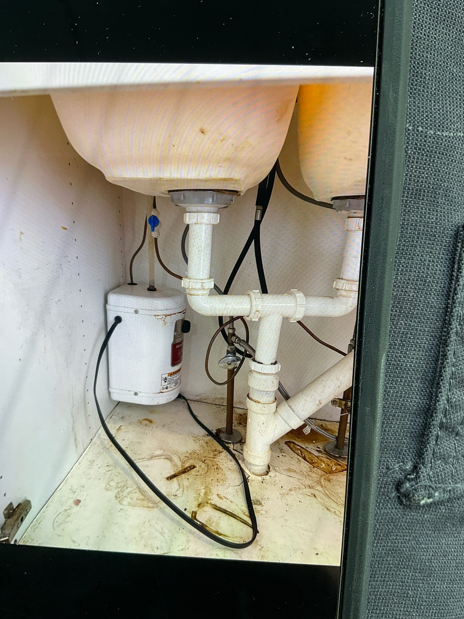 Under one kitchen sink remove existing insta hot. Install new customer supplied insta hot with faucet.

Customer called us out for few things. One was to install customer supplied kitchen faucet and insta hot under sink. Also that one sink wasn’t draining great. Customer agreed to have insta hot installed. Went ahead and attempted to install insta hit but found that faucet base assembly clamp was broken. Contacted customer support and they need proof of purchase. Wasn’t able to get into contact with customer so left note for customer in what to do to get replacement part and also phone number if she has any questions. Once replacement part is in we will be able to come back out and install insta hot at no additional cost. At this time just removed existing insta hot and properly disposed of it. 