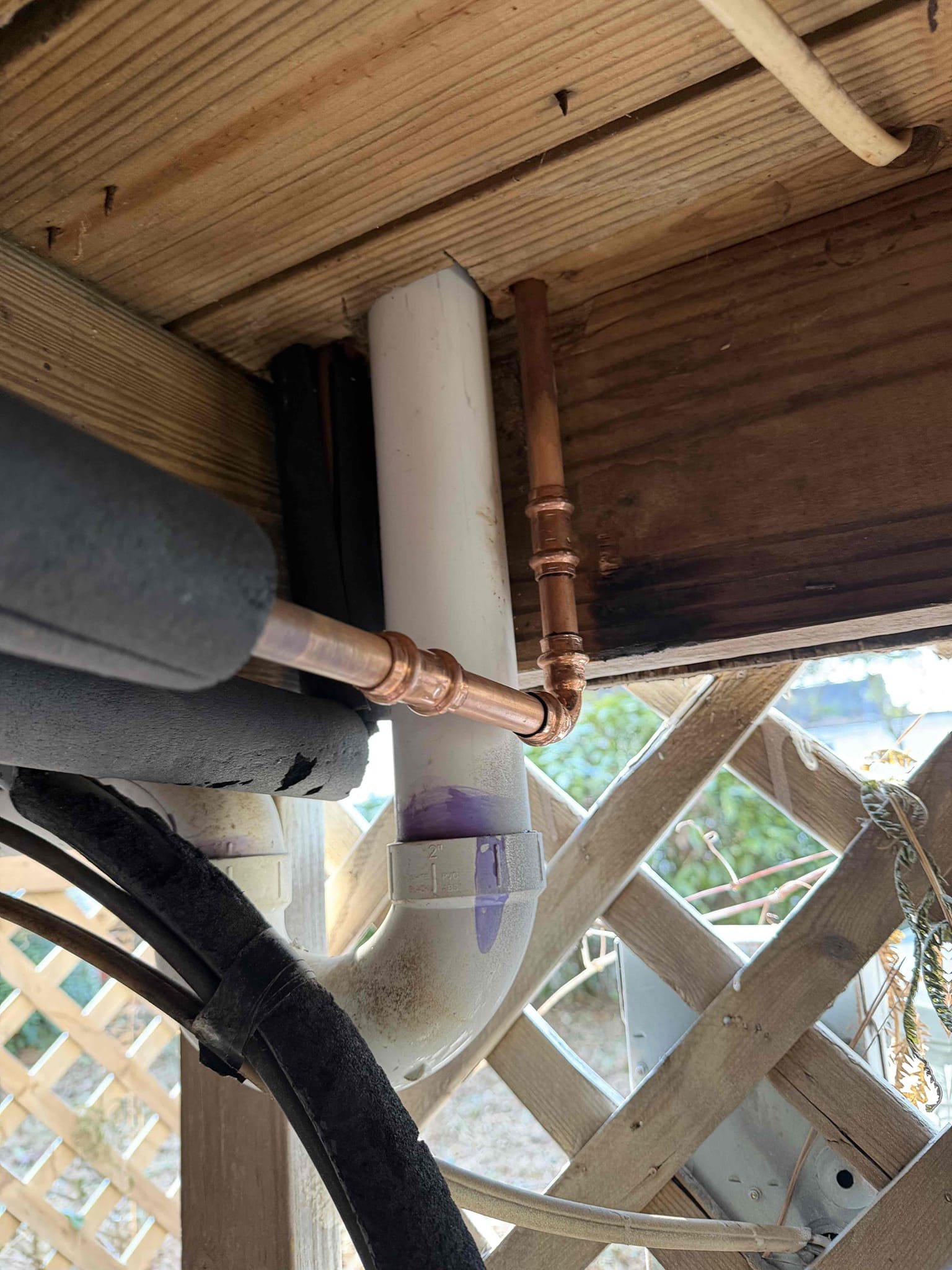 Cut out section of copper that is leaking. Repair section and test.

Customer stated that there was a waterline leaking on the porch. Found that copper broke on 90 from freezing. Gave customer quote to make repair and customer agreed. Went ahead and made repair by cutting out small section of pipe and replacing it with new copper piping. Turned water back on and tested, and no leaks were present at this time. Tested water, pressure and water pressure tested fine. Cleaned up work area.