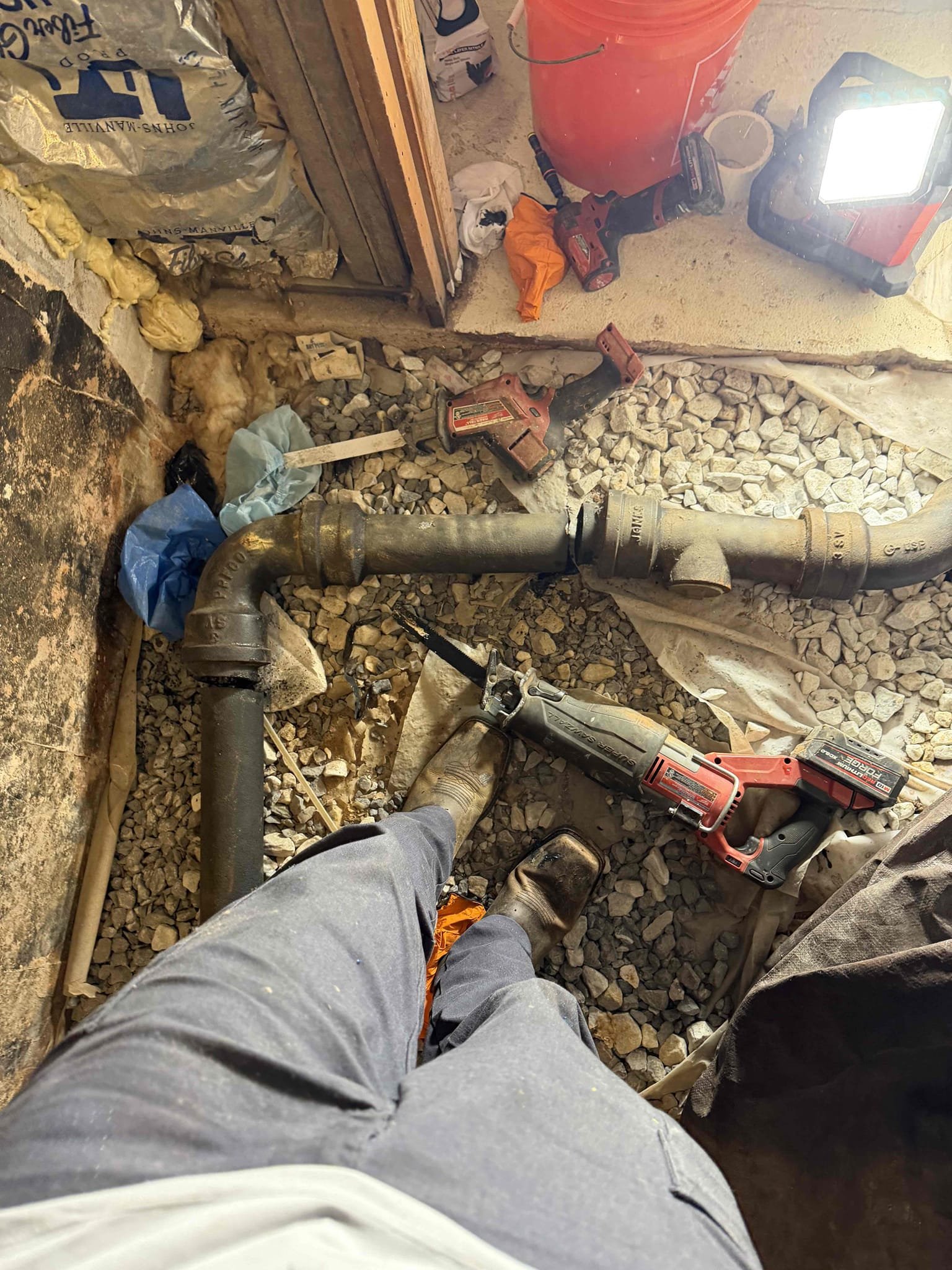 Run snake through kitchen drain line and clear stoppage. Afterwards run camera and inspect line.
Remove section of old cast iron piping and replace with pvc. Reroute kitchen drain to different drain and cap off old drain.

Customer stated that kitchen sink was backing up. Gave customer quote to run snake and customer agreed. Went ahead and ran snake and afterwards ran camera from clean out. Found out there was a lot of sludge buildup in pipe and recommended customer replacing section of cast-iron with PVC and customer agreed. Went ahead and cut out section of cast-iron and capped off drain. Rerouted drain to tie into another drain line. Afterwards filled up sink multiple times to test and now kitchen is draining as it should and no leaks were present at this time. Cleaned up work area.