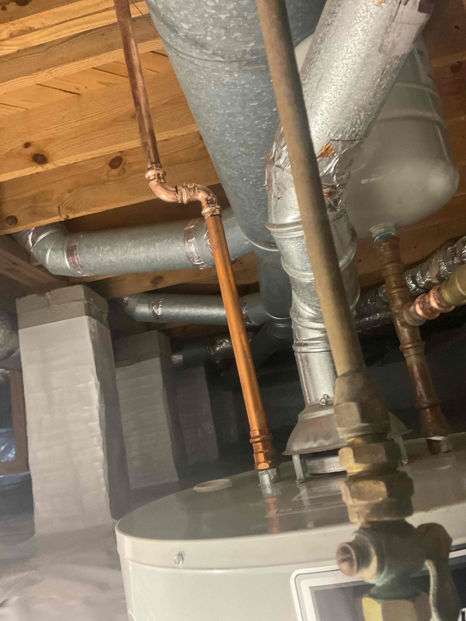 This job came back out to the customers home to reconnect the water heater in the crawlspace because the people doing the encapsulation have finished what they were needing to be done so therefore, I set the water heater back into the pan that connected the water lines, reconnecting the gas line and then reconnecting the vent as well used all proper connections once installed there are no leaks the same way it came out was the same way it was put in. There’s no gas or water leak used three screws per joint on every event connection that was taken off. CUSTOMER’s water pressure is at 60 psi. Set the water heater to the temperature of “a” which is indicating 120°F.  No further issues at this time.