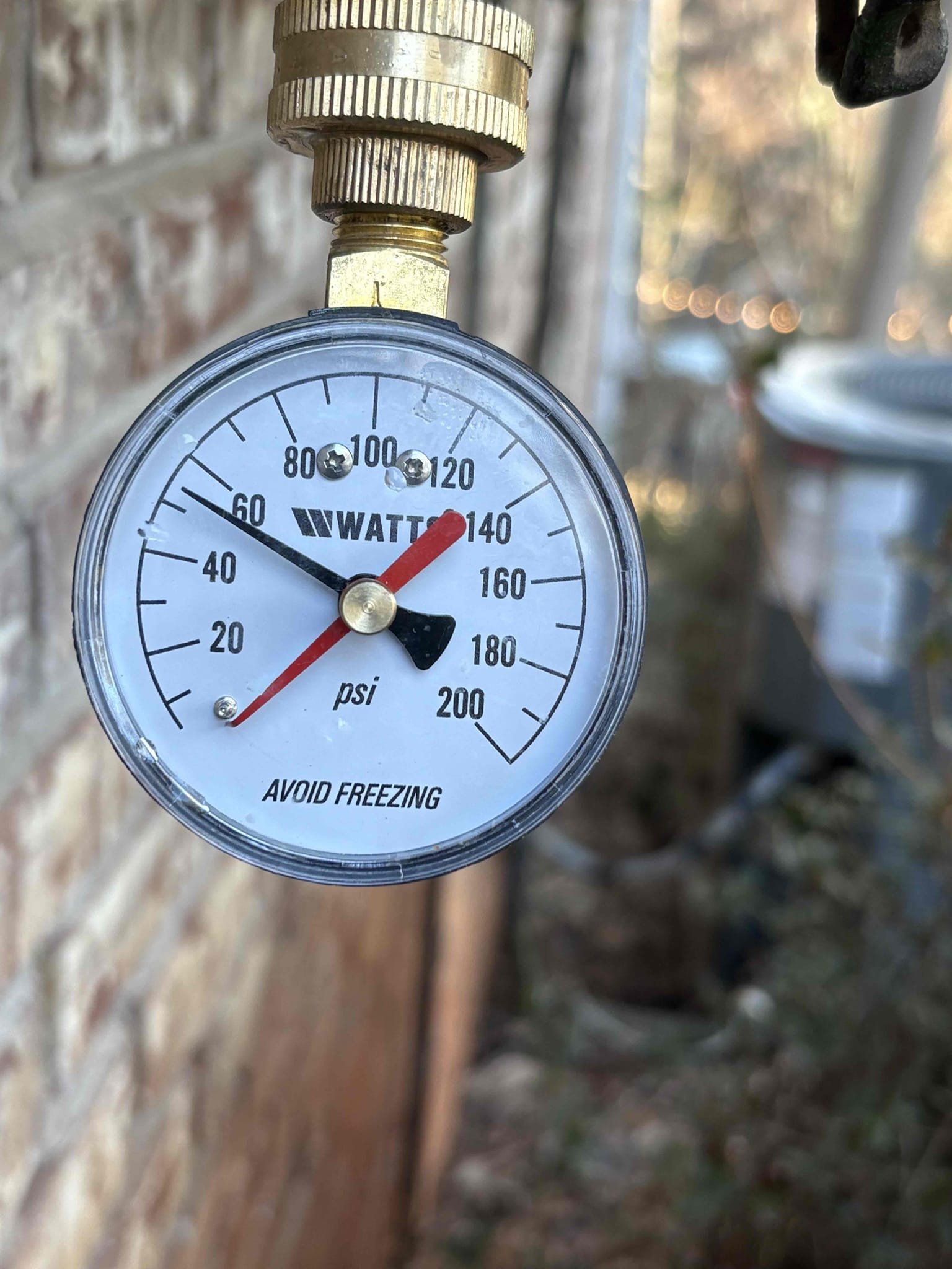 Client called us out today due to them having some drain backup issues. Client is on septic and had some work done under garage floor replacing some old cast iron pipe with pvc. When they did that, they added a cleanout in garage floor. We ran the camera down the cleanout all the way to the tank and determined the septic tank is full and needs pumped. The remaining cast iron pipe does look rough with some channeling but not backed up. 
Checked water pressure and it was high at 120 psi. Safe range is 50-79 psi. We cut out the old pressure regulator and replaced it, moving it further back on the line because the water heater was not regulated before. Added new ball valve and pressure regulator as well as a couple pipe supports. Turned water back on and tested, no leaks. Home pressure is now around 60 psi. 

1 yr warranty on pressure regulator.