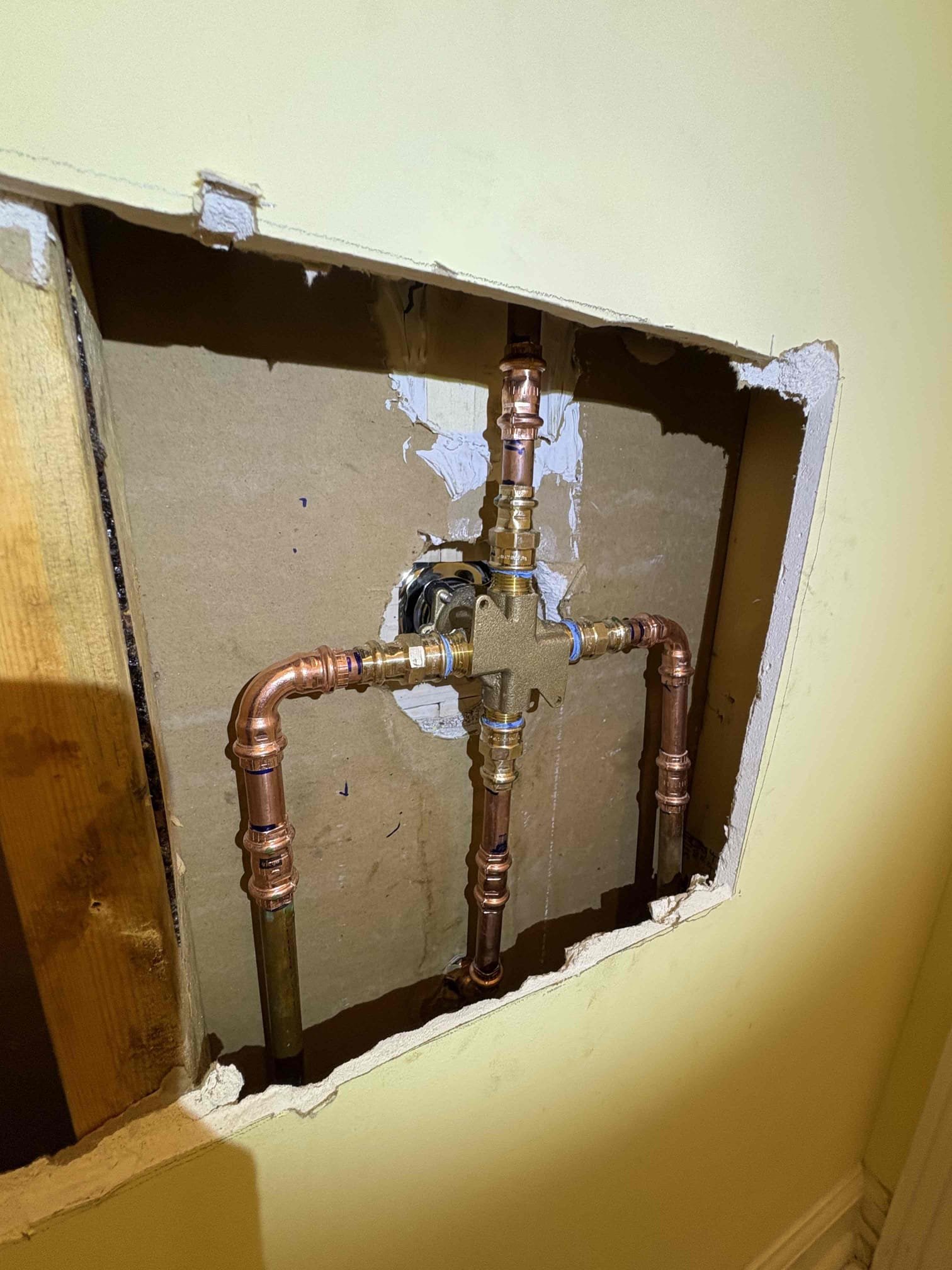 Called out today due to an issue with an upstairs bathroom tub/shower valve that was making a knocking noise when turned to hot all the way. It was an old American standard about 20 yrs old. Checked water pressure and it was 100 psi which is higher than safe range of 50-79 psi. High water pressure will cause just about any issue one can have on the plumbing System. First, we replaced the failed pressure reducing valve with new of same model, and installed new ball valve shutoff for customers reliable use in future. We also replaced the shower cartridge, but after turning water back on to test, it did not fix the issue. Client ordered new tub/shower valve and trim and we went and picked it up, then returned to cut the Sheetrock behind and install it. After installation of valve and trim and after testing, cleaned up our mess and caulked around the new trim. We had to cut a bigger hole than planned to replace the valve, so we will order a bigger access panel to cover that hole, then come