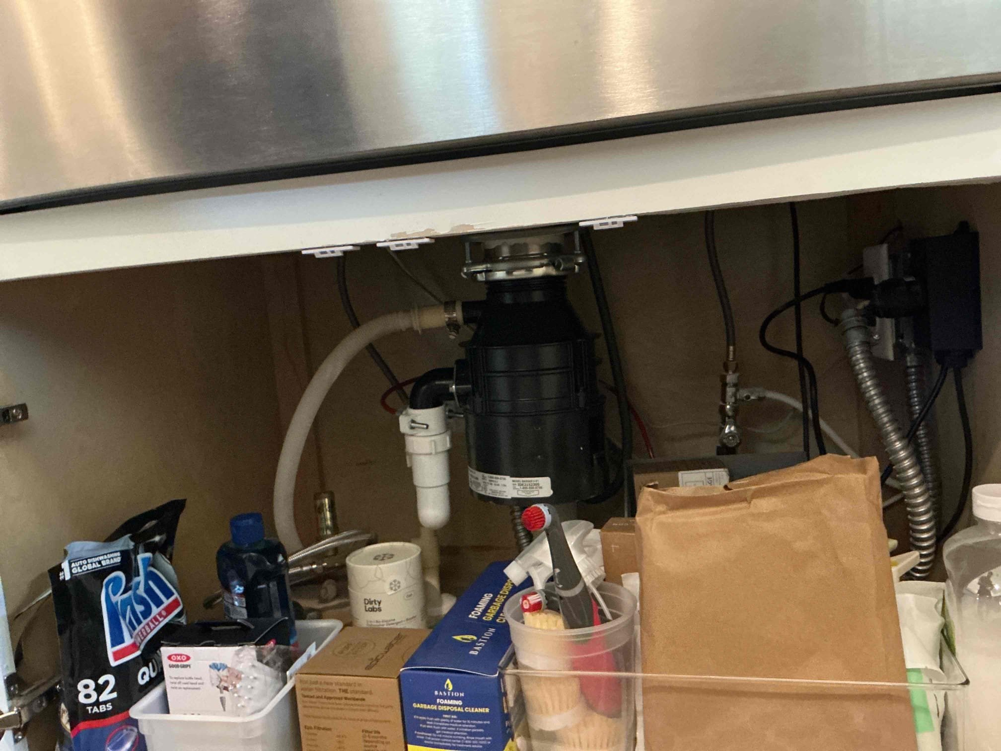 Customer had drain clog caused by heavy disposal usage. Due to age and process of work needed. Suggested to replace disposal. After replacement, which cleared drain, checked for proper drainage, leaks, and proper function. 