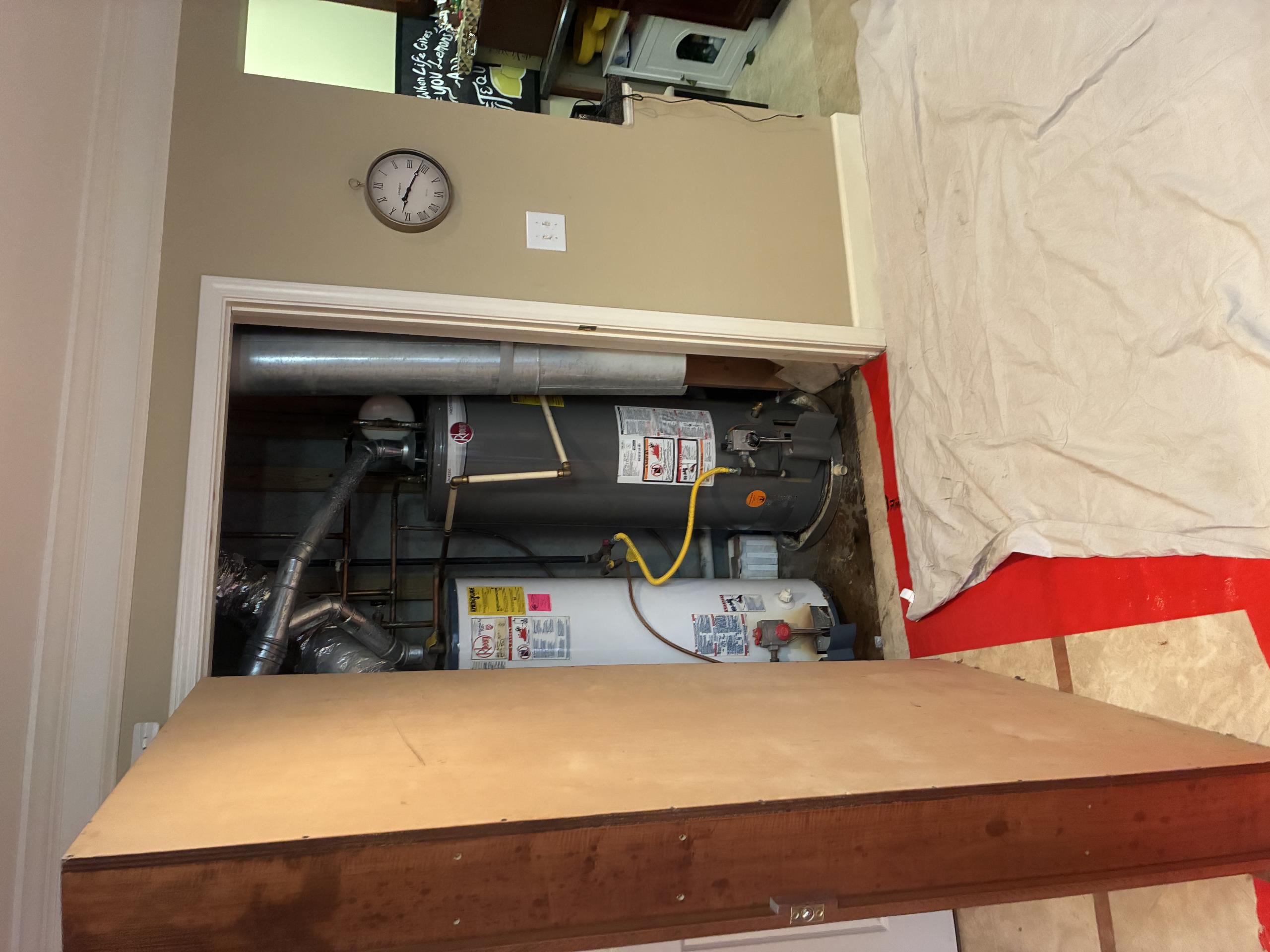 Return to install tankless water heater and pressure regulating valve.

Removed two failed water heaters, along with a significant amount of corroded copper pipe. Installed Navien gas tankless water heater with recirculating capability, and crossover tee in master bathroom left side vanity.

Replaced main shut off and pressure regulating valve.

Tankless included adjusting and reworking gas line and valve.

New exhaust line ran.

Reworked significant portion of copper pipe.

New shut off valve for humidifier line

Cleaned site and removed as much water as possible. 