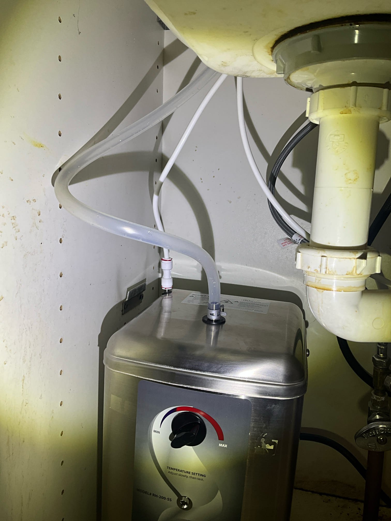 Returned and installed customer supplied insta hot water dispenser. The job had already been collected for, so the customer has a 0 dollar balance on the job as of this visit. Tested all work to ensure proper function and no leaks. None were found at this time. Customer had concerns about 7nit spitting on initial setup. Troubleshot the manual and confirmed that is normal operation when unit is starting up for initial setup when boiling the water. 