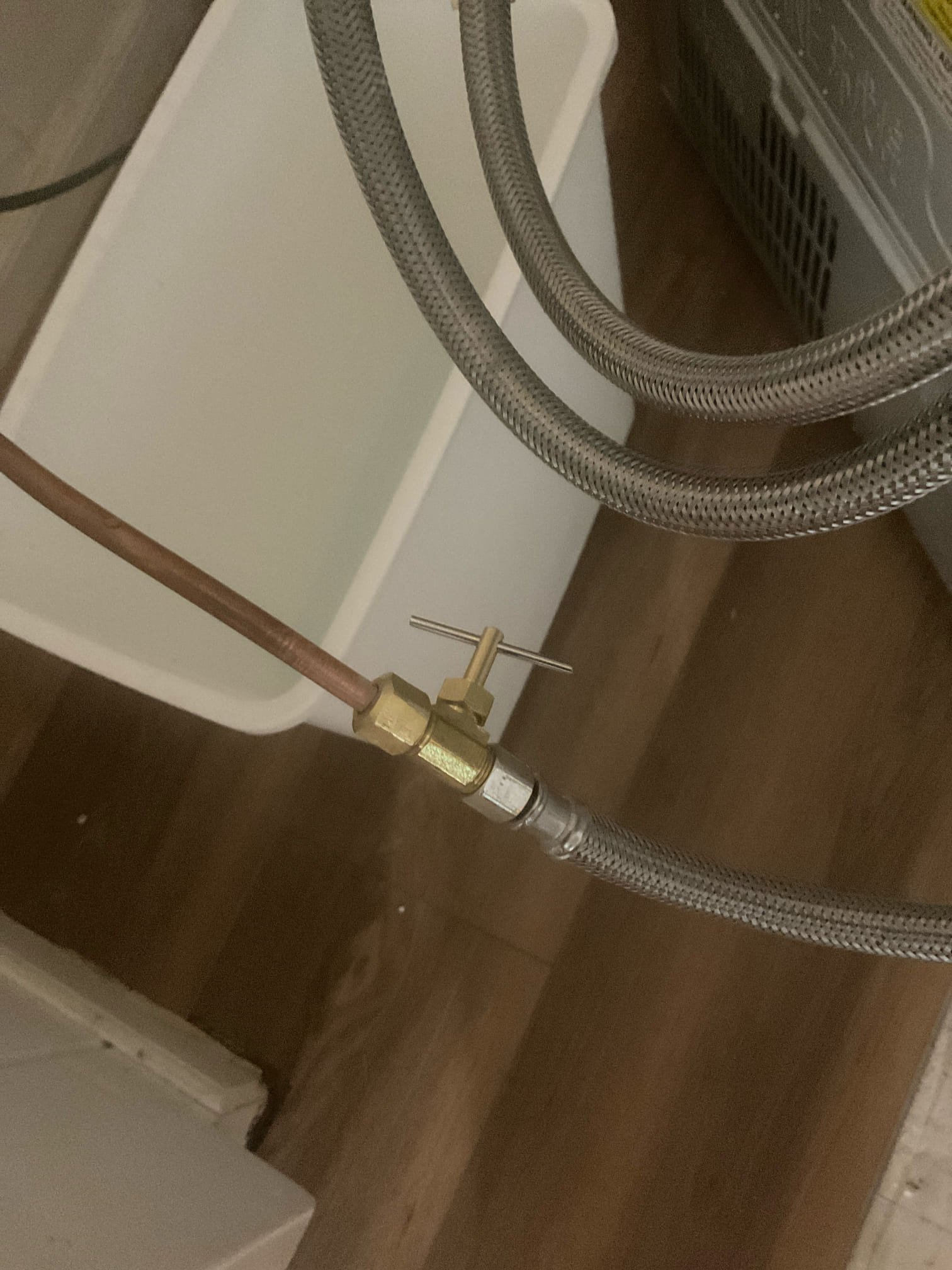 Replace needle valve for refrigerator 

Shut water off to home and replaced needle shut off valve for refrigerator line. Turn water back on and tested. No leaks were present at this time. Also recommend replacing thermal expansion tank. Will send estimate to do so.
