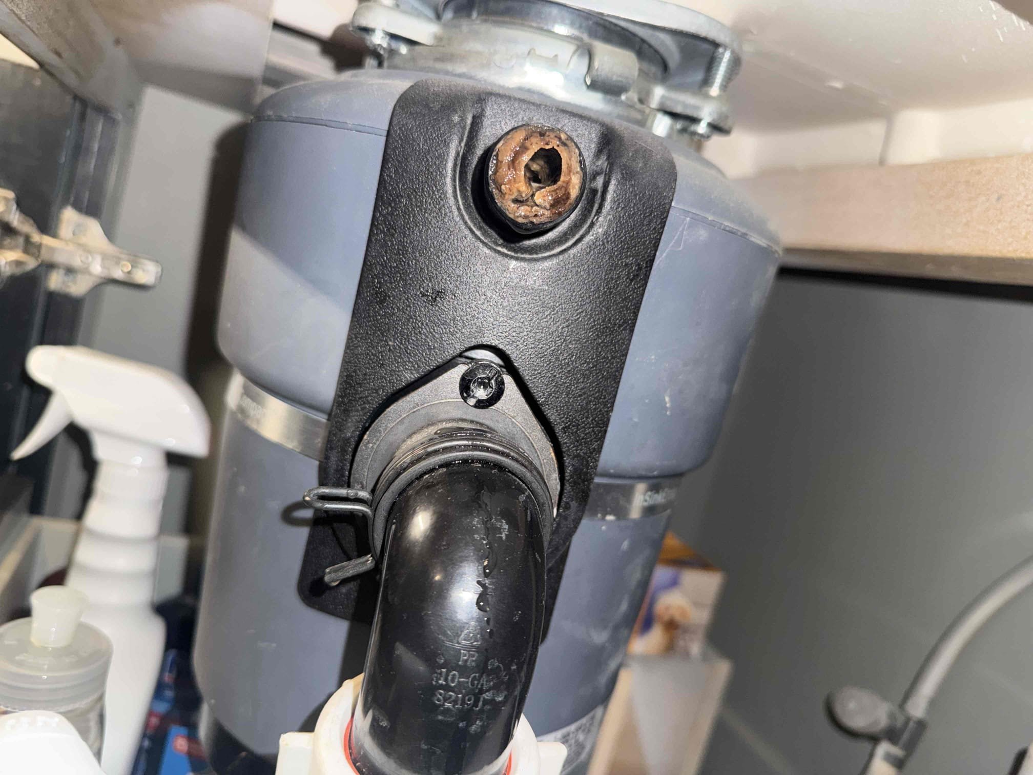 Dishwasher not draining upon arrival. Customer stated the dishwasher will no longer drain. After looking noticed clog at the disposal inlet where the dishwasher drain hooks up. Informed customer we could clear that blockage out of the disposal and make sure the rest of the drain line was clear. Gave customer estimate, customer approved estimate. Cleared blockage from disposal and hooked shop vac up to dishwasher drain and was able to suck the water out of the dishwasher meaning the drain line is clear. Ran dish washer but dishwasher would not drain itself. Informed customer to call an appliance guy to resolve any further issue with the appliance.