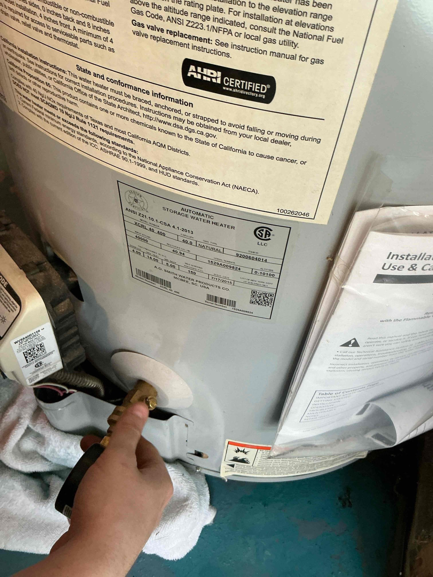 Water heater leaking upon arrival. Customer stated he noticed this morning his water heater was leaking. Informed customer when they start to leak they have to be replaced. Gave customer estimate, customer approved estimate. Installed new Rheem 40 gal gas short water heater with new pan, expansion tank, and shutoff valve. Turned water and gas back on to check for leaks. Found no leaks. Fired up water heater. Water heater is working properly and no leaks upon departure.