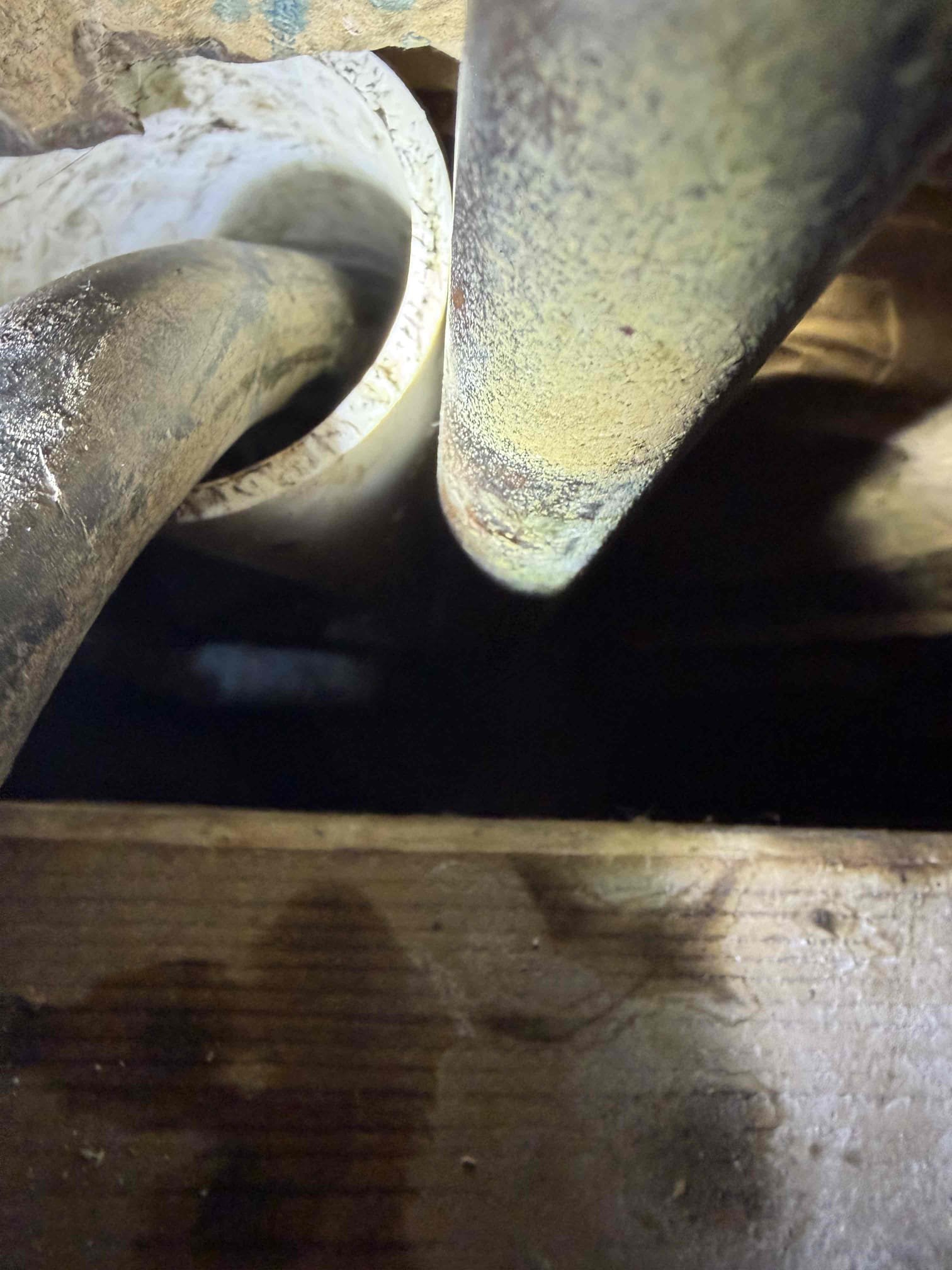 This customer came out to her house to figure out an issue with the laundry drain line. It goes PVC into a cast-iron stack. However, the bathroom next to the washer and dryer was flushing and draining just fine so I believe it was just an issue with the standpipe going into the cast-iron stack after doing my further investigation I believe I was right. I recommended that we use a flex shaft to clean out the pipe to get all the debris out and I pulled back some cast-iron remnant however the cast-iron is not leaking. It is in between a shared wall between the crawlspace and slab so in order to replace that we’ll have to bust up the slab and go into the crawlspace to make that replacement With that in mind I was able to clear and clean the standpipe and the lateral line going into the stack with the flex shaft and then once I finish cleaning out that pipe, we ran a cycle on the washing machine to make sure that it was draining properly and it dumped down the drain line twice with no back 