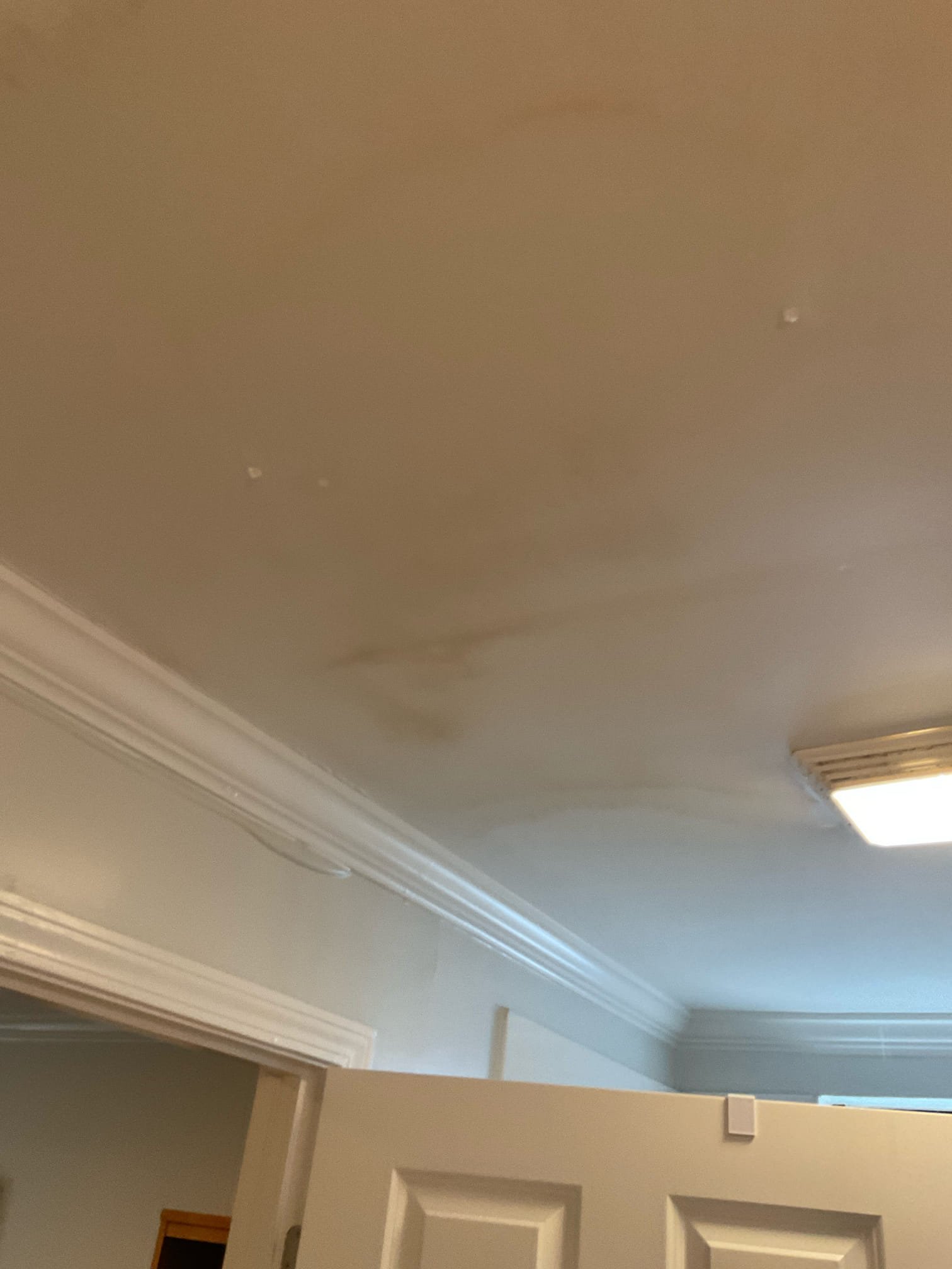 Stain in garage ceiling, Opened ceiling inside garage , did not find any plumbing related leak , also today we found a leak in basement bathroom ceiling caused wet carpet and floor , fixed busted copper pipe in ceiling, replaced main water shut off valve and Prv today as well . Pressure was 125 psi . 