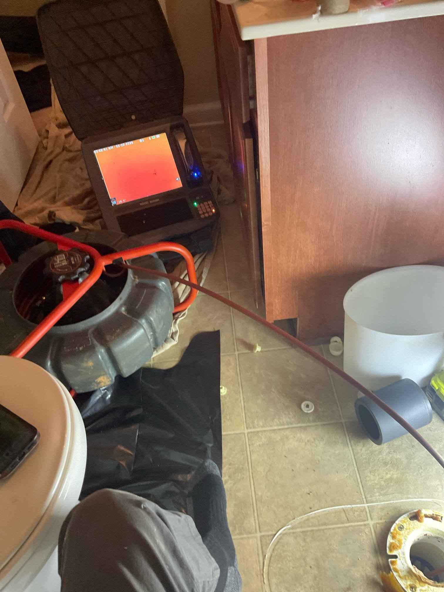 Customer had water leak down from upstairs bathroom to the ceiling below , we checked found issue is from soft tissue back up from the line for both bathroom, we removed hallway toilet cleared blockage , we inspected the pipe with video camera , we found belly in the line for first 8 feet , this may happen again because this problem. 