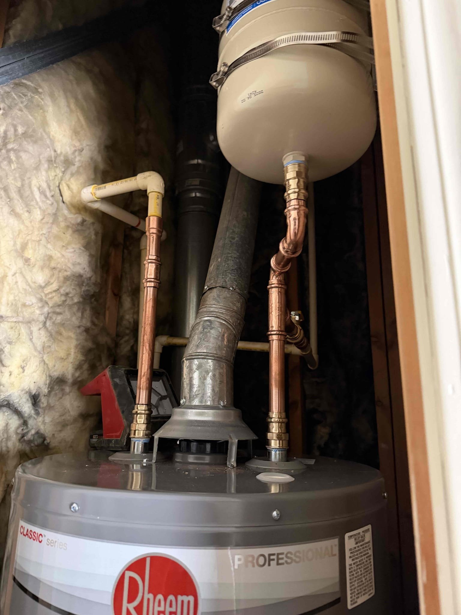 Remove existing water heater and haul away. Furnish and install new 40 gallon gas, tall heater with new thermal expansion tank and drip pan under heater. Also install new tank shut off. Also rework piping.

Removed old water heater. Furnish and installed new 40 gallon gas water heater with new thermal expansion tank and tank shut off. Also rework both hot and cold water lines. Tested and no leaks were present at this time. Bleed out as much air from the system as possible. Turned water heater on and there should be hot water within 45 minutes. Cleaned up work area. Also found that water pressure is at about 75 to 78 psi. Recommend recommended to customer have PRV replaced. Will send estimate to do so.