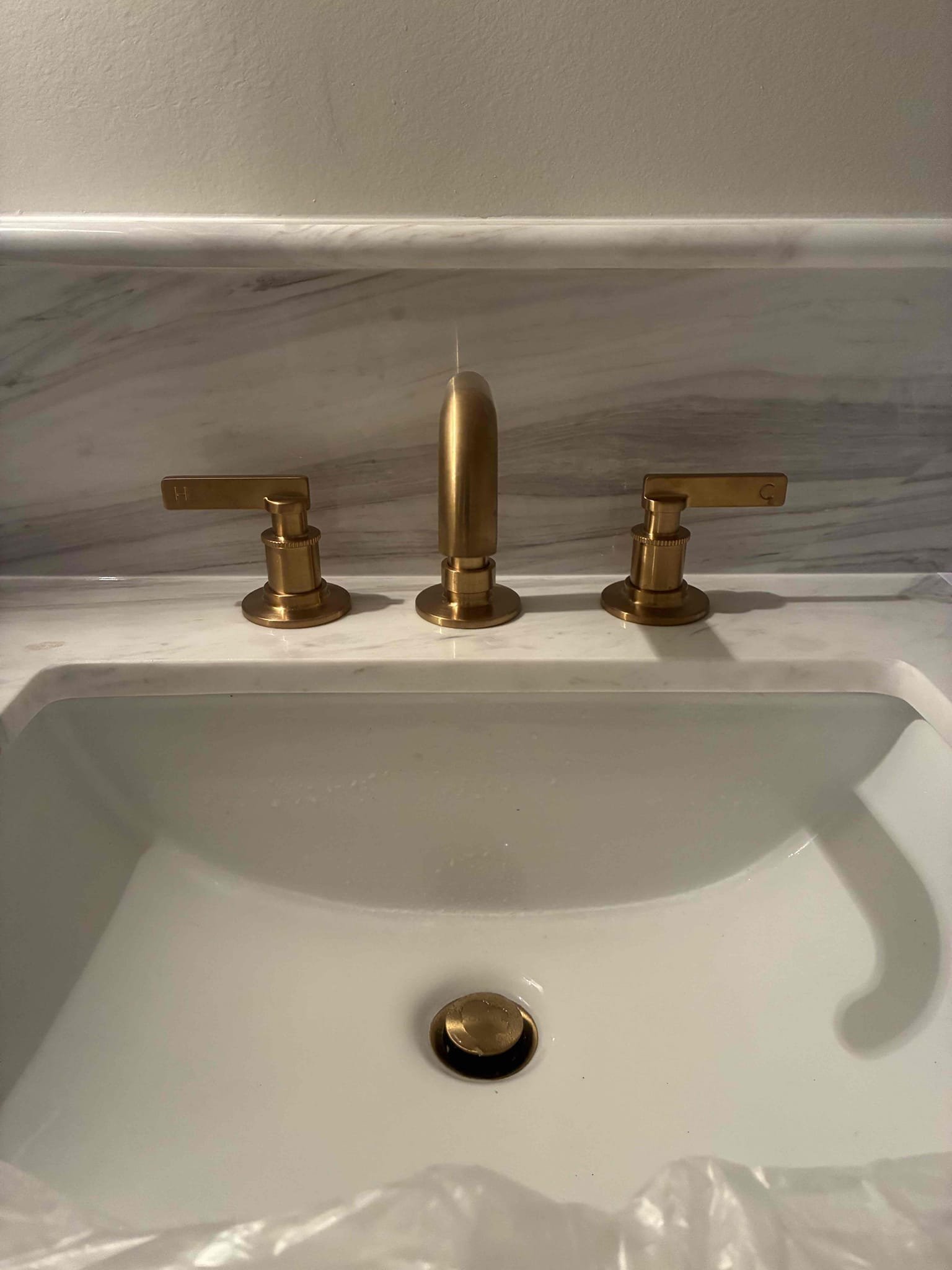 Customer wanted to replace multiple faucets during home renovation. Gave multiple quotes for various replacements.  Replaced widespread faucets in upstairs master bath, kids bath and downstairs hall bath after replacements checked for leaks and proper function. Will return to install other items once items arrive. Explained to customer about exterior overflow assemblies. 