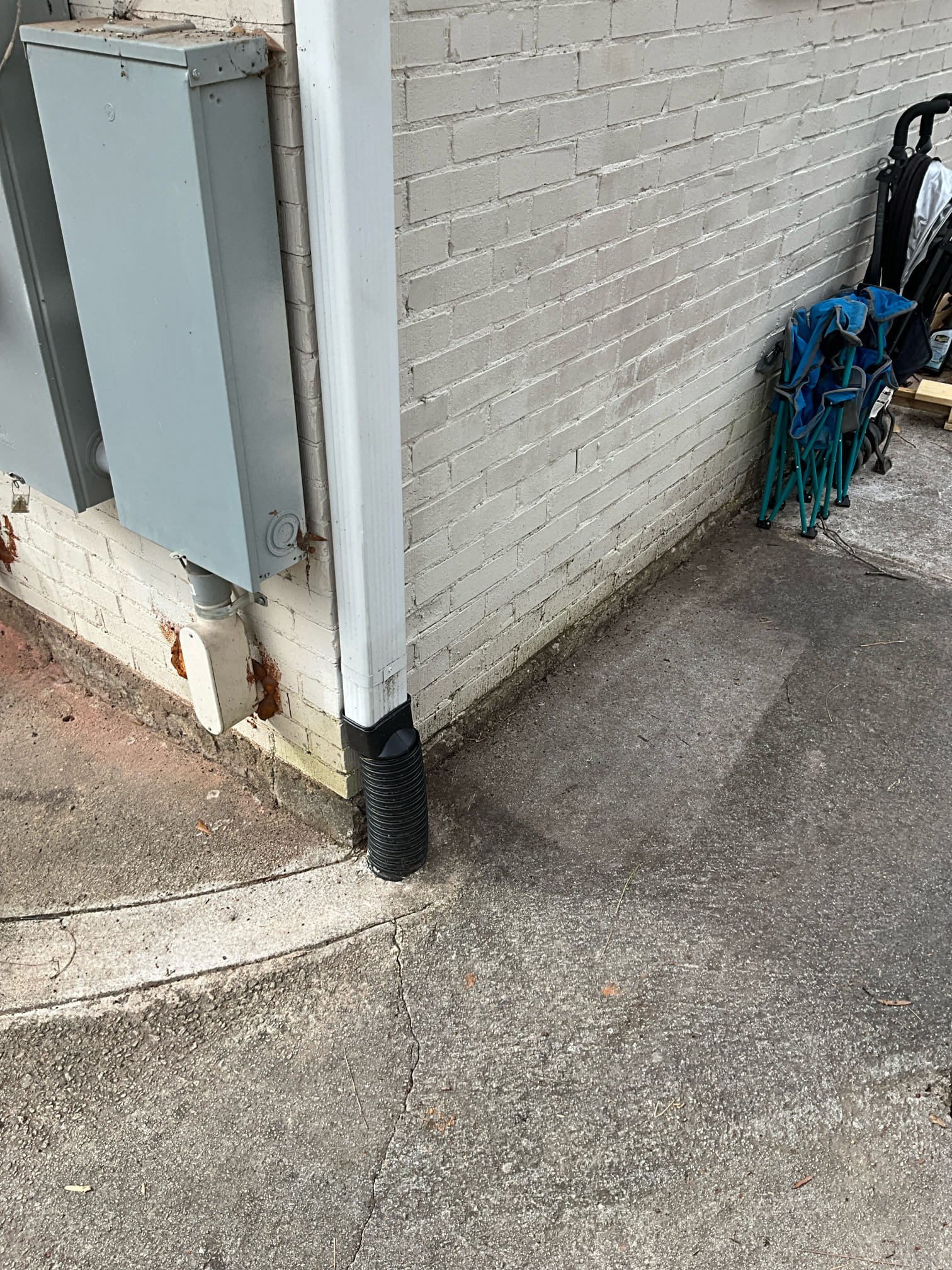 Jackhammer slab in basement, replace broken section of cast iron pipe, camera rest of line, remove concrete basin sink, jackhammer slab and install sump basin, install catch basin at bottom of stairs, route drain from catch basin to pump basin, run discharge out back of house, cut hole into corrugated downspout and run 1.5” pvc drain into downspout drain. 

Performed work as quoted. Ran water into the basin and tested new system to ensure everything was draining correctly. Poured back the concrete. No further issue at this time. 

Camera’d rest of sewer line after we had removed broken section of pipe. There are two separate bellies in the line, one under the foundation wall, and one out in the yard. We left quote to reroute sewer line across crawlspace and out front of the house in a new location. Sewer line will back up again at some point due to the standing water in the drain.

