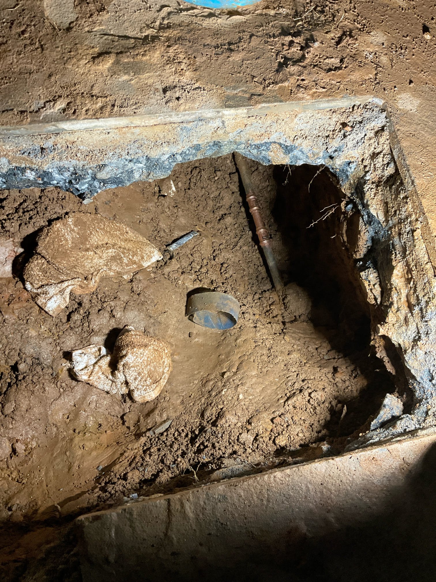 Used jackhammer break 4-6 inches thick concrete after water meter , found and fixed cracked pvc tee fitting connected to main line for irrigation system , by customer requested we disconnected irrigation system permanently because customer thinking get separate water meter for the irrigation system in the future.we get water on and checked no further leak at this time,fill hole back , not include fix concrete and stone back . 