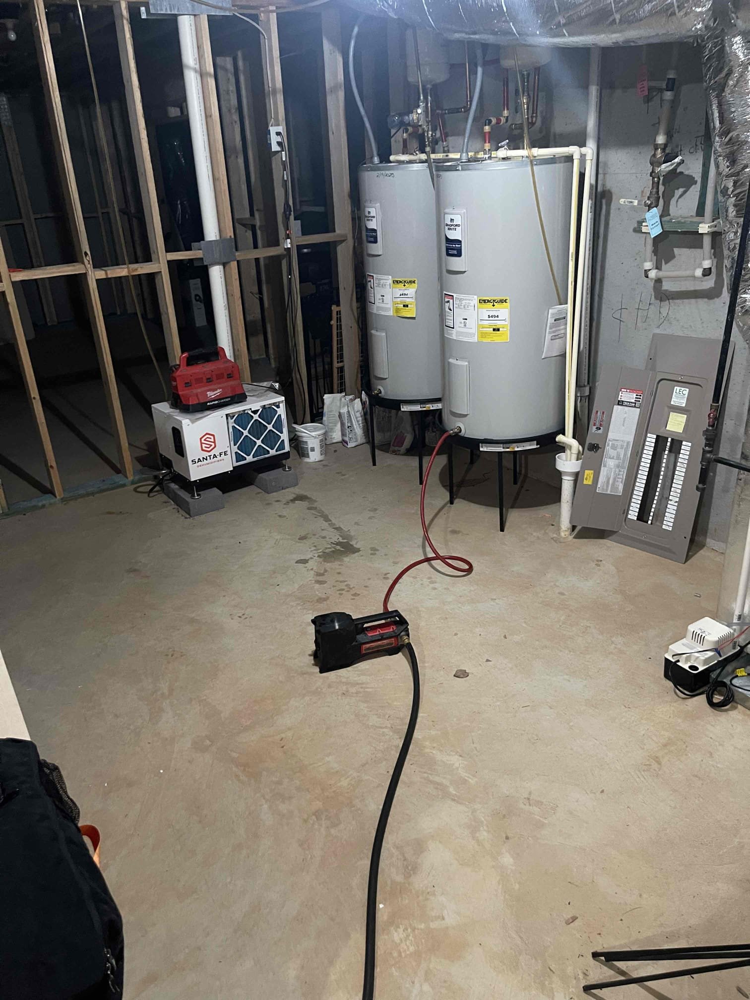 Came out for low water pressure at the hose bibs. Issue was not related to our previous service visit. Both hose bibs are piped in after the pressure regulator, and house pressure is at 50 psi. Confirmed both hose bibs are at the same pressure. Gave quote to reroute water supply to hose bib on left side of house. Will connect the hose bib before the pressure regulator to get better water pressure for washing vehicles. Cannot increase the pressure at the hose bib in the right side of the home as it is a mixing valve with hot water supply as well as cold water. Because this valve is connected to the water heaters, we cannot increase the water pressure to this valve without increasing water pressure to the whole home. Homeowner requested we flush the water heaters on this visit. Shut down power to both water heaters and flushed both tanks completely. Filled both tanks back up, purged the recirculating line, and confirmed power was on to both tanks. No further issue at this time. 