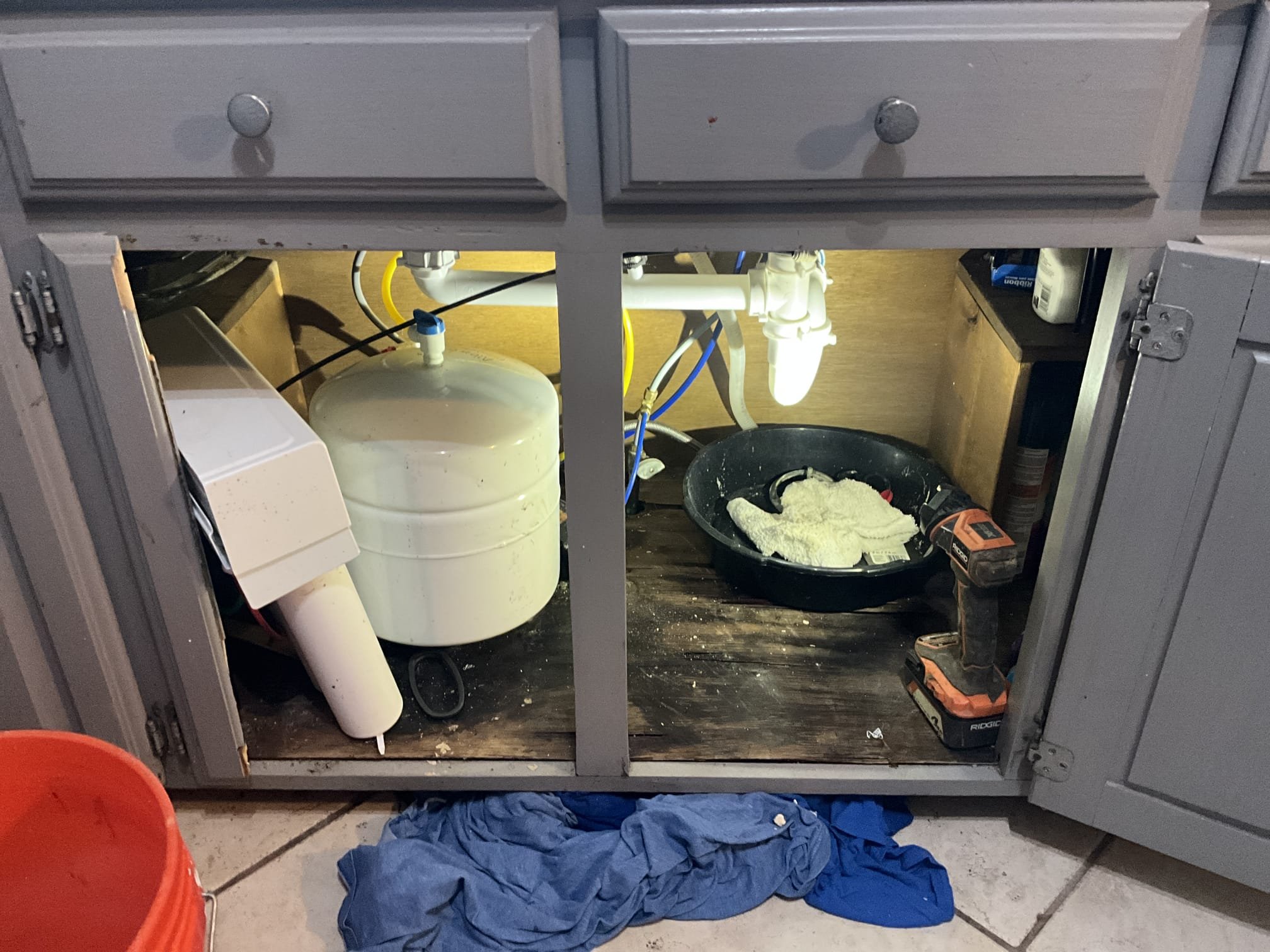 Customer had a leak from under sink. Customer removed all tubular piping below the sink and replaced the sink strainer on the right side compartment. Found evidence of a large water presence under the cabinet and in the basement below the floor. Recommended customer have water damage assessed. Gave customer price to replace the left compartment strainer, the tubular piping below with a new trap, and connecting the diswasher and RO waste line back to the work. Made customer aware that there isn’t enough room to properly work everything back into the vertical lines and if there are any other issues, we will have to rework the line in the wall to give more vertical space. Also made customer aware of the presence of non/steel braided supply lines, old stops and that can’t be shut off properly, and no proper loop on the dishwasher drain. Tested all work to ensure proper function and no leaks. None were found. 