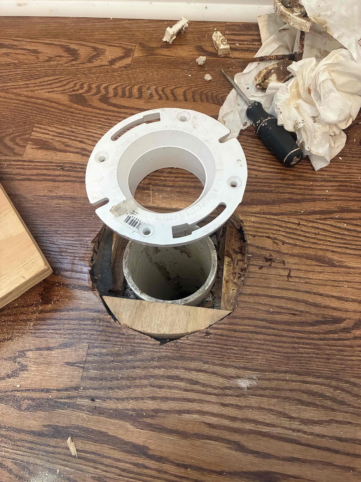 Customer needed flange replacement due to broken flange during new floor. Gave customer option for replacement of flange removed flange installed new secure to floor after installation checked for security of flange unable to test with water due to bathroom not being done.