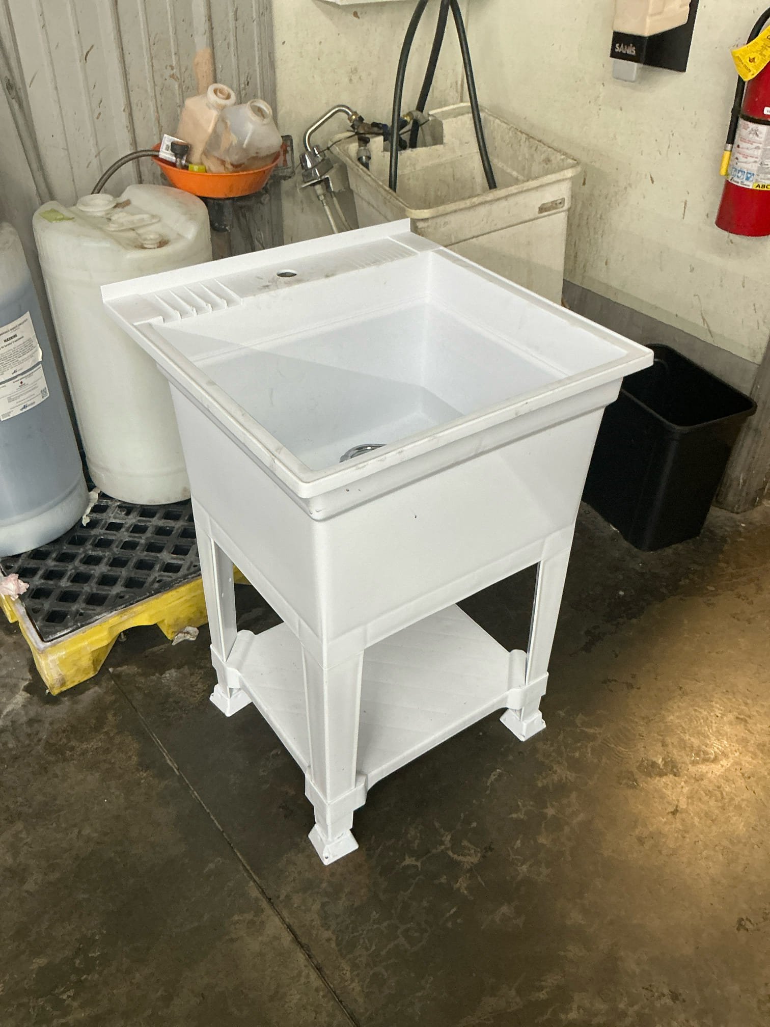 Called out to install the customer supplied laundry sink in the shop. Previous one had broken along with the drain pieces below. Installed the same faucet after drilling the holes in the new sink as well as new supply lines. Mounted the new sink to the concrete then connected all the new drain pieces below. Tested, no leaks. 


Charged card on file and emailed invoice. 