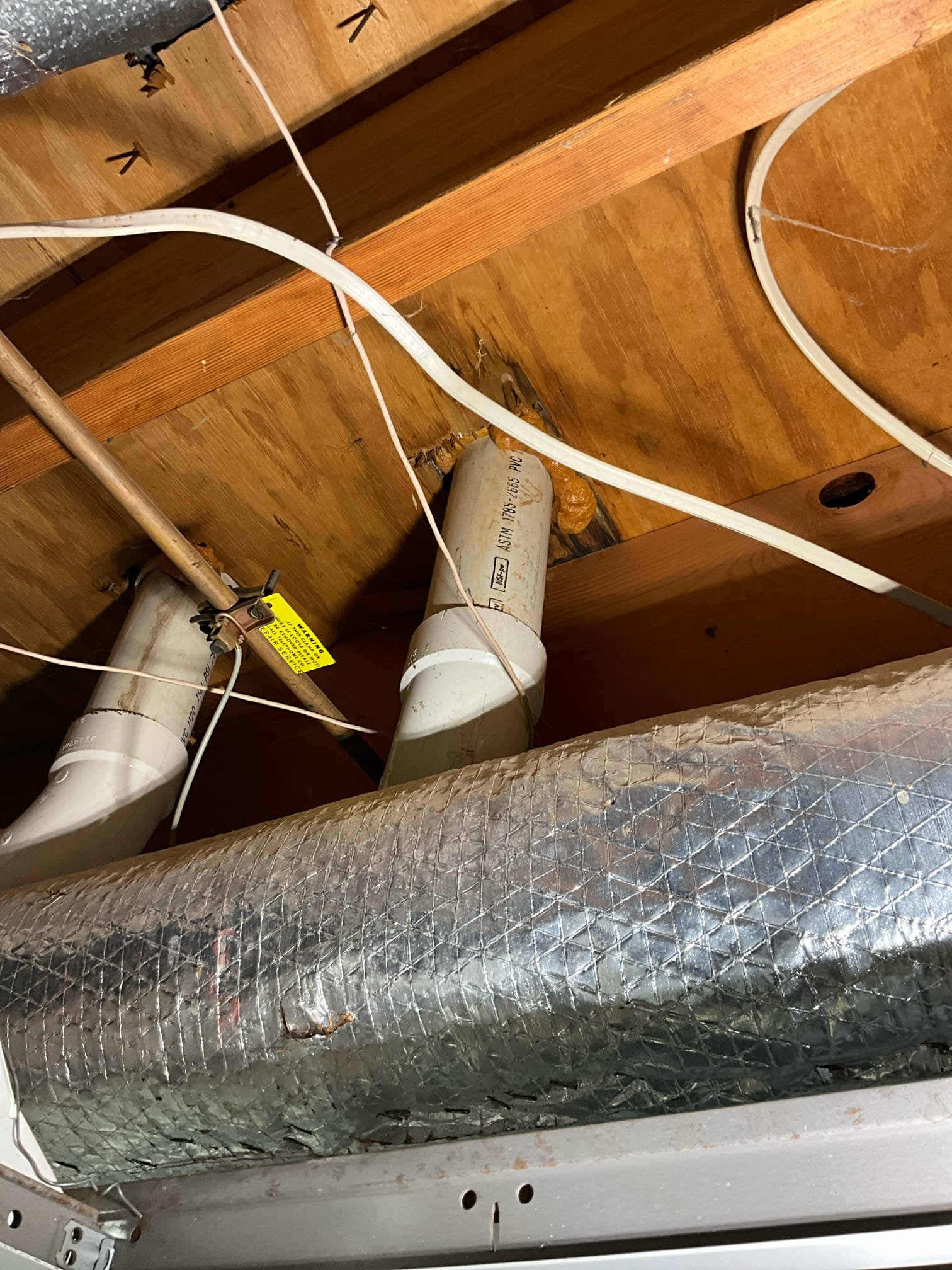 Call for leak near toilet after recent toilet installation.

Arrived and met with Ms. Paula. She said she came down last night and noticed water in the same area as our last visit. 

We inspected and checked all plumbing, and kept Ms. Paula informed as we progressed.

Inspection revealed that was was coming down and traveling along a three inch pvc line, but not the main level toilet line. This line is a couple feet away and serves the master bathroom, specifically the toilet and the shower. After investigating we determined we needed to open the wall and ceiling. Once open, we found a 90 degree elbow joint that was cracked and leaking when the toilet and shower were ran. During a prior visit, we found water dripping from the main level toilet, as well as on the floor, from a loose toilet. While the toilet was loose and leaking, I believe today’s leak was being masked by the toilet issue. We also resolved a soft tissue clog at no charge while on site. 

During this visit we repaired th