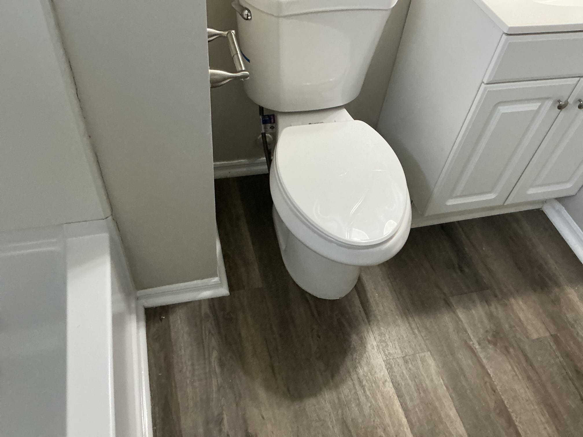 Homeowner not present. Had someone meet to review potential issue. Customer stated water was on floor around base of toilet no water present when I arrived flush toilet several times looked around surrounding areas but found no leak. Checked pressure.