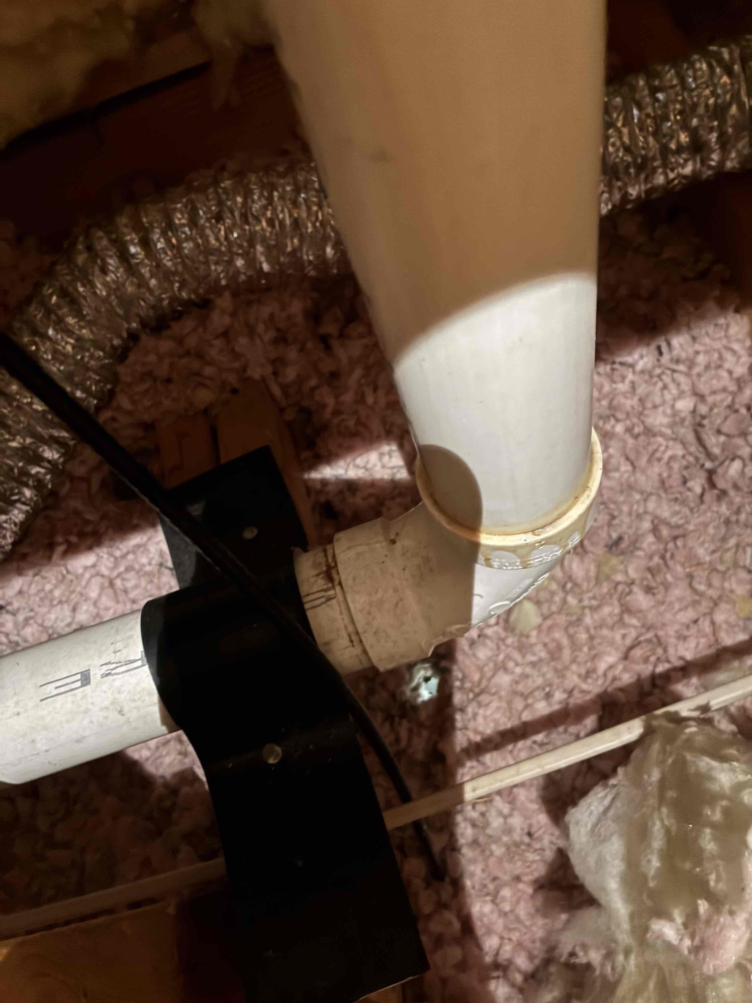 In attic found pvc fitting unglued and causing leak into ceiling below. Remove section and replace with new section or pvc piping and new elbow. 