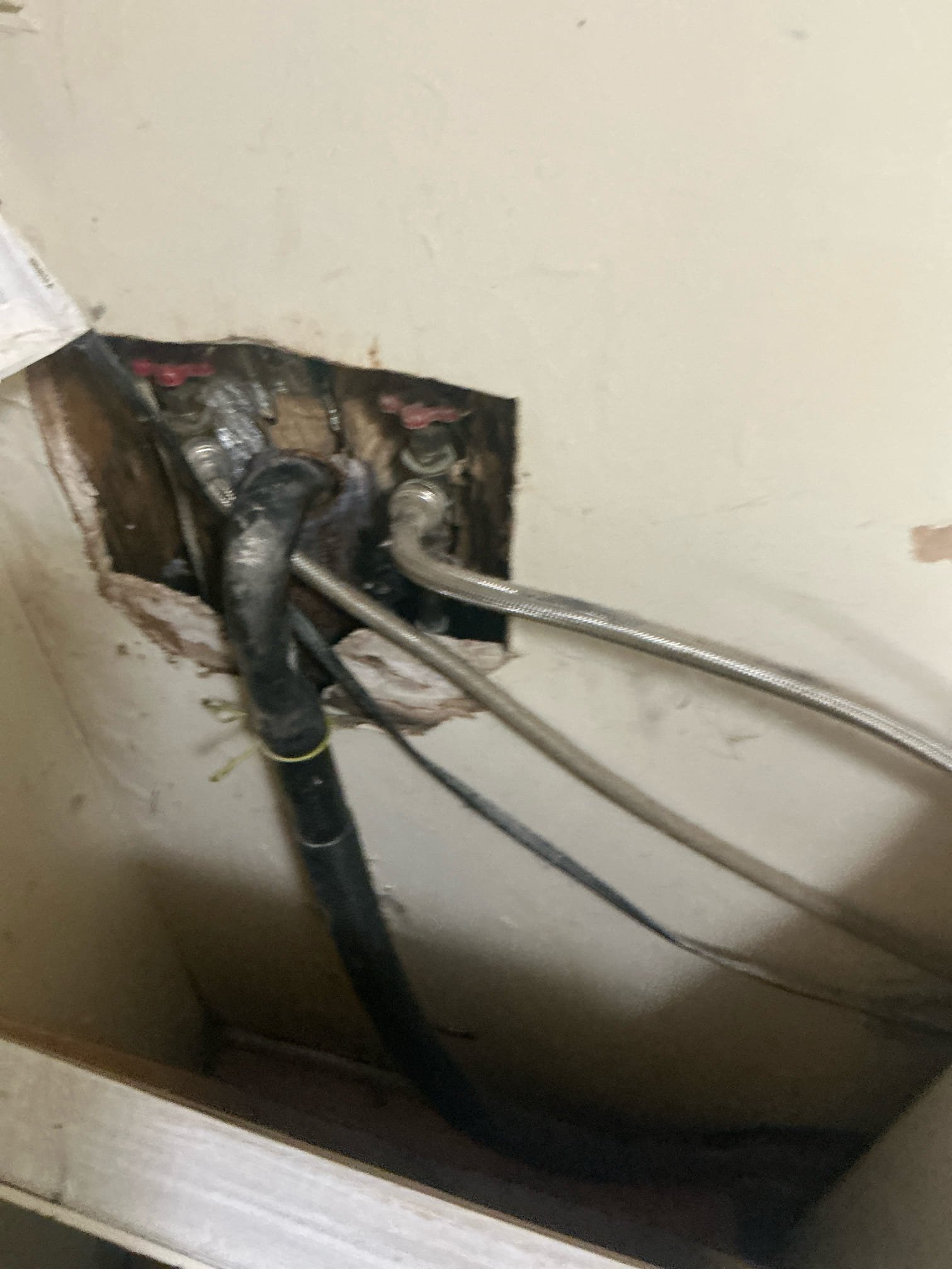 Found lavatories drain clogged. Snake drain to clear blockage. Found washing machine clogged. Snaked with 25’ cable to clear blockage. Filled an dumped washing machine to test. If problem continues recommend jetting drain from roof vent.