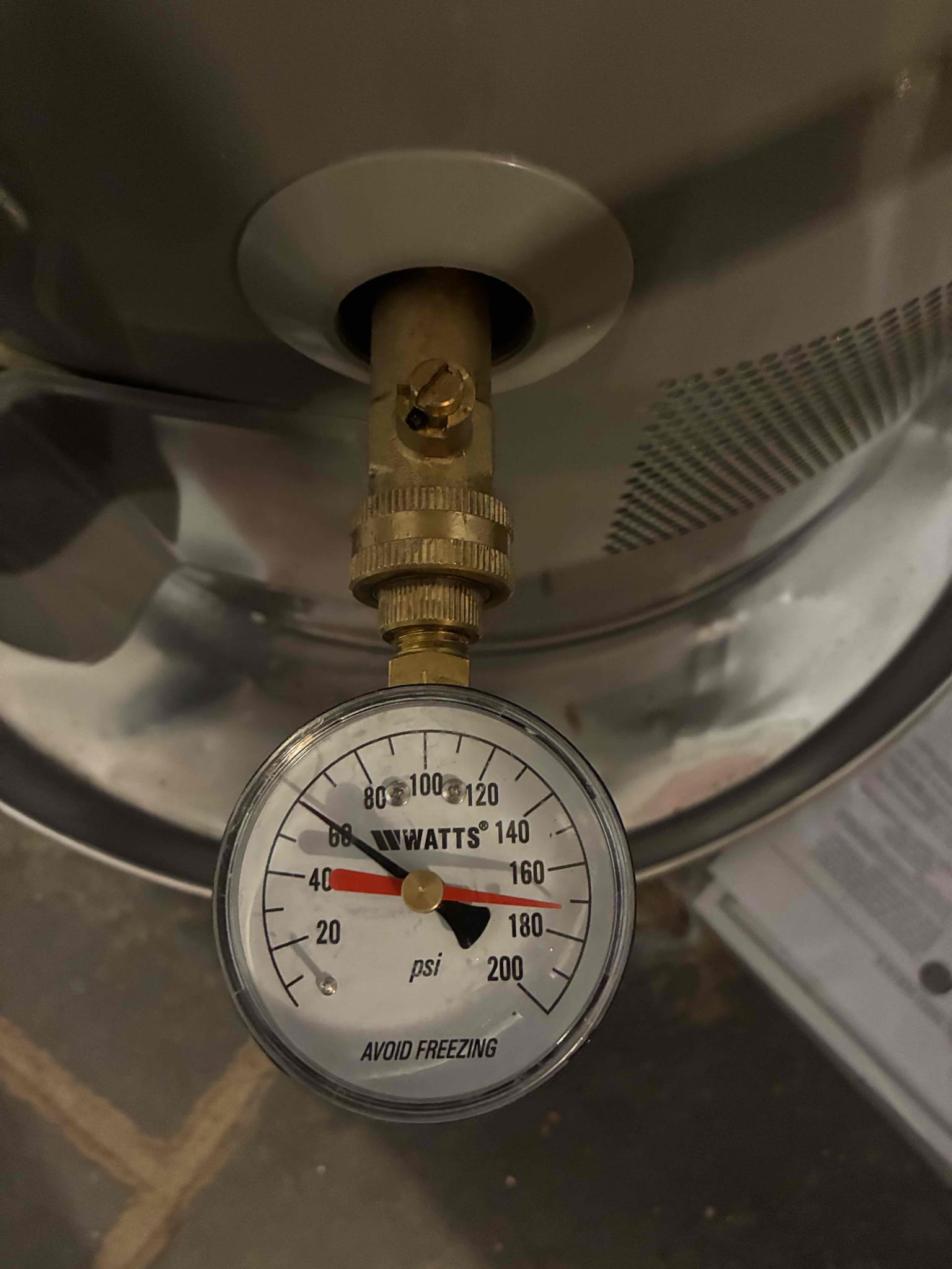 Shut off water to home and drain system before water filtration system. Remove pressure regulator that was installed with flow in wrong direction causing loss of water volume. Reinstall pressure regulator going in direction of proper flow. Test for proper operation 