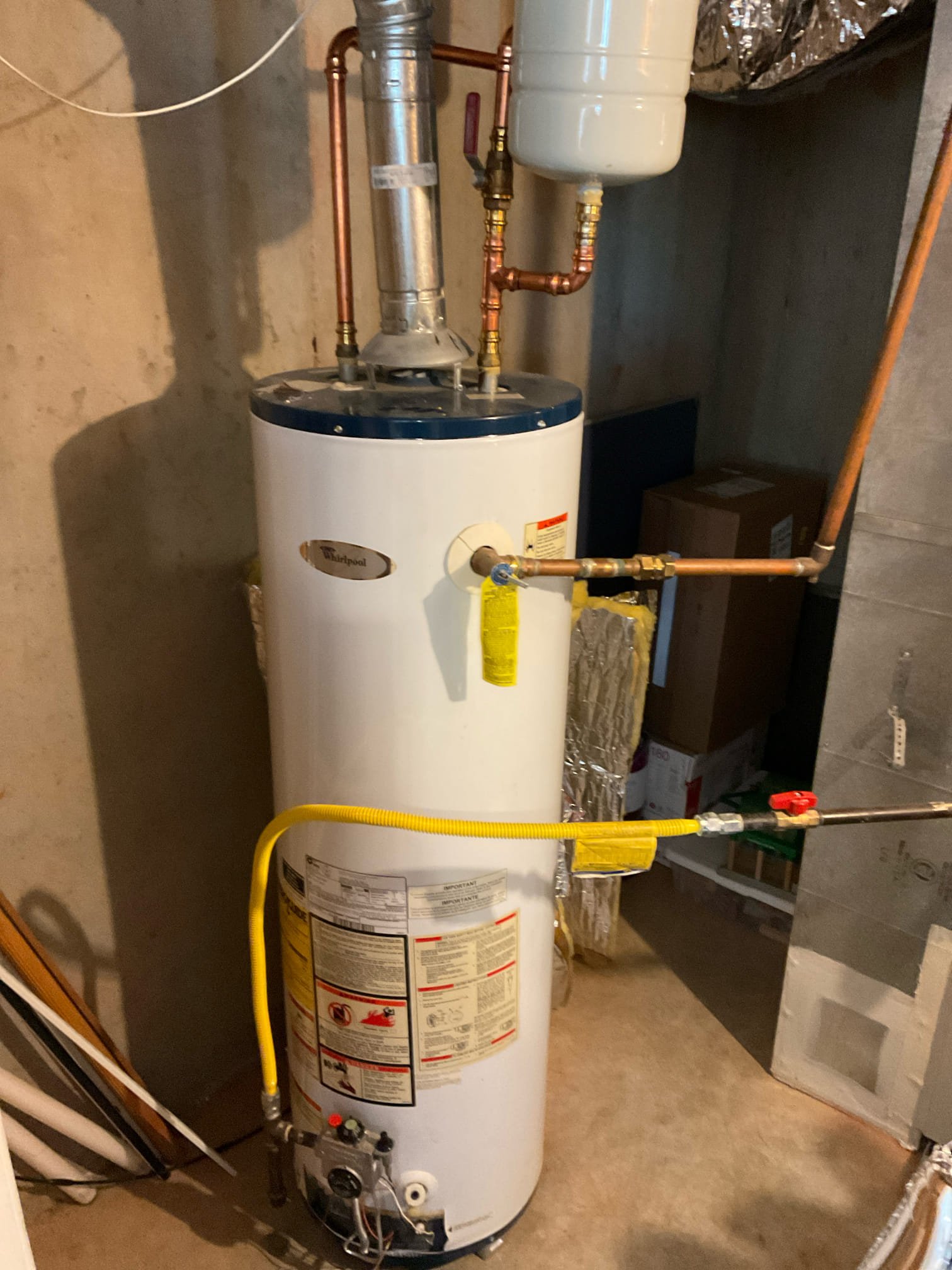 Remove existing water heater and haul away. Furnish and install new 50 gallon gas water heater with new tank shut off and thermal expansion tank. Also install drip pan under heater.

Did quoted work. Tested and no leaks present at this time. Lit water heater. There should be hot water in about 45min. Cleaned up work area.