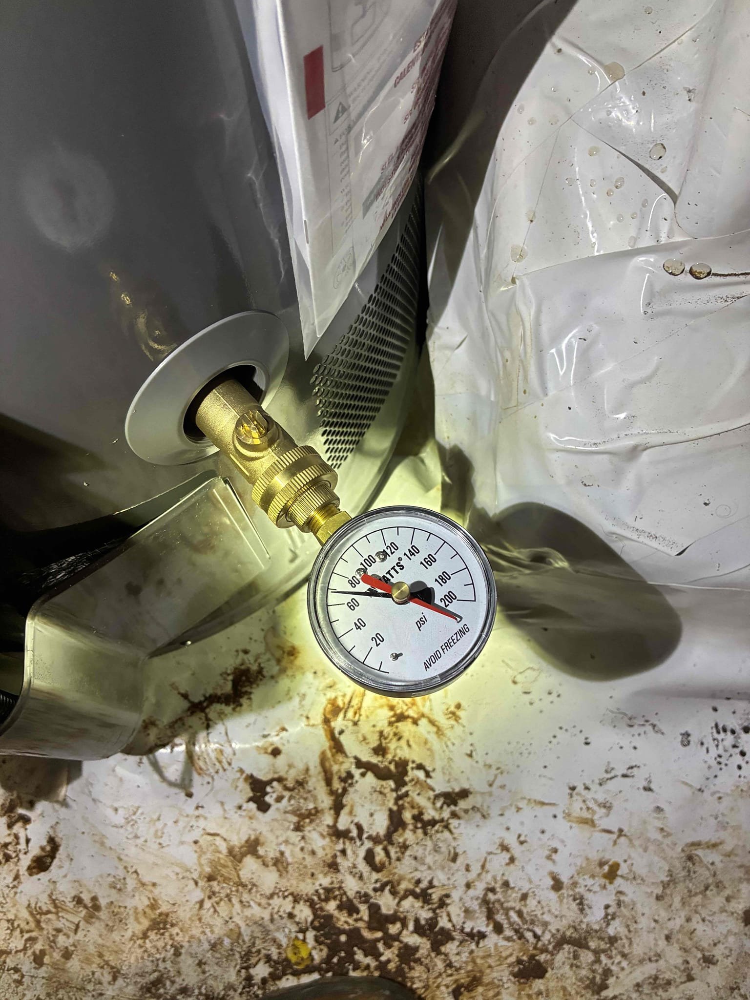 Shut off water to home and drain water system and water heater. Cut out and remove old water heater. Provide and install new 50 gallon gas water heater. Install new thermal expansion tank. Test for proper operation 
Upon arrival tried locating pressure regulator and main shut off valve on main line coming in or in valve box near meter. None were found. Install new pressure regulator and main shut off valve 1/4 turn ball valve. Test for proper operation.