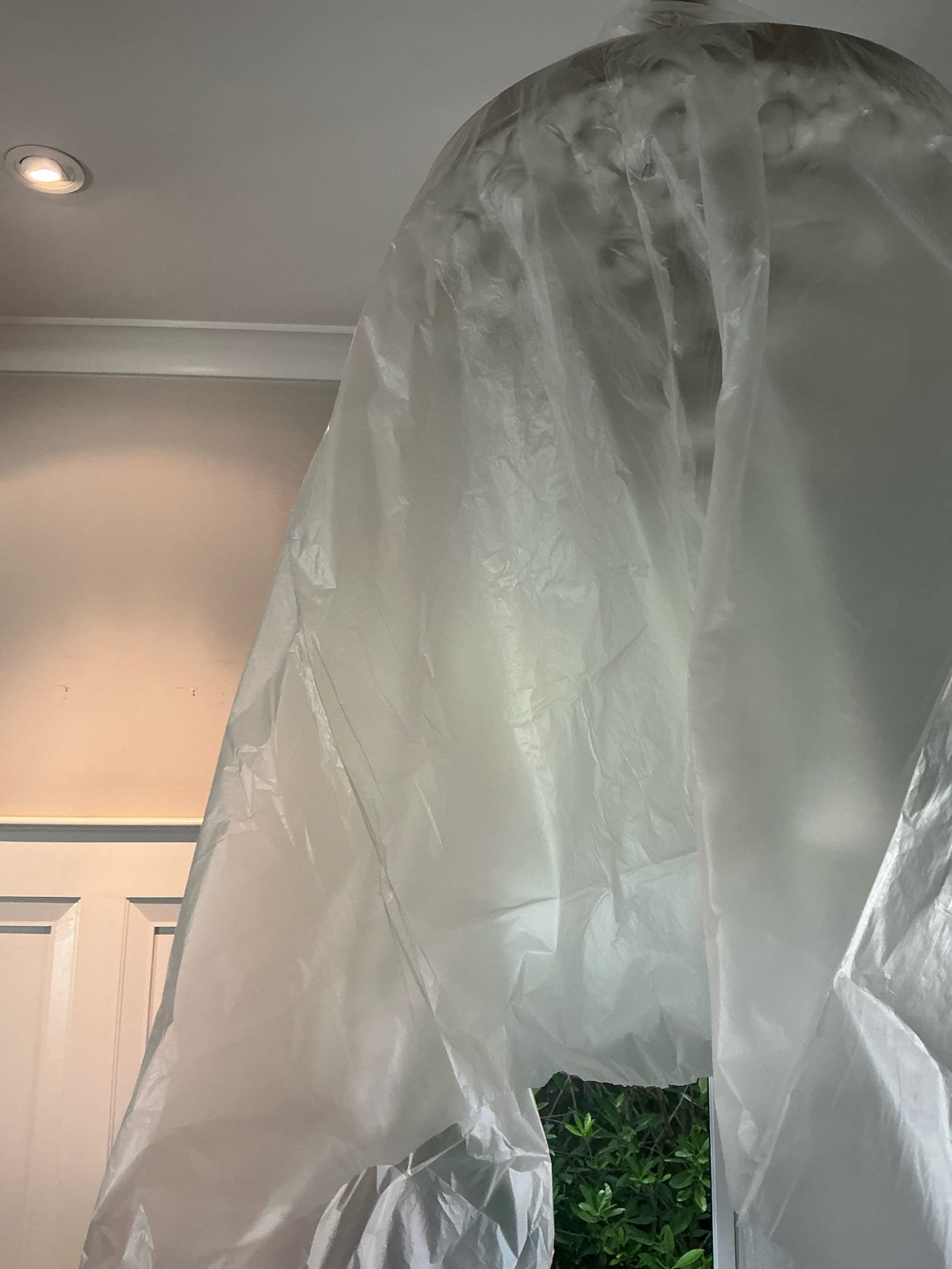 Found wet spot in ceiling below upstairs restroom tub. Cut sheet rock to expose drain. Ran tub and shower to check for leaks. Could not replicate leak. Caulked openings around tub&shower trim.