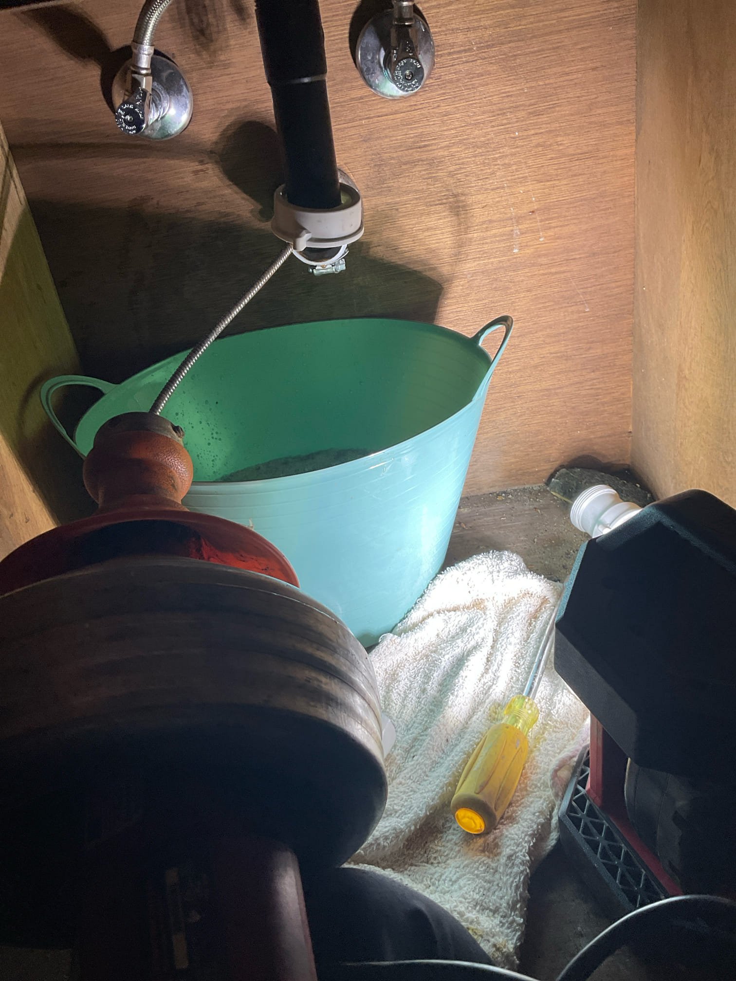 We fixed clogged bathroom sink drain in the back of the home today , remove d p trap , snaked line inside walk with cable snake , cleaned line and tested , drains well now , 