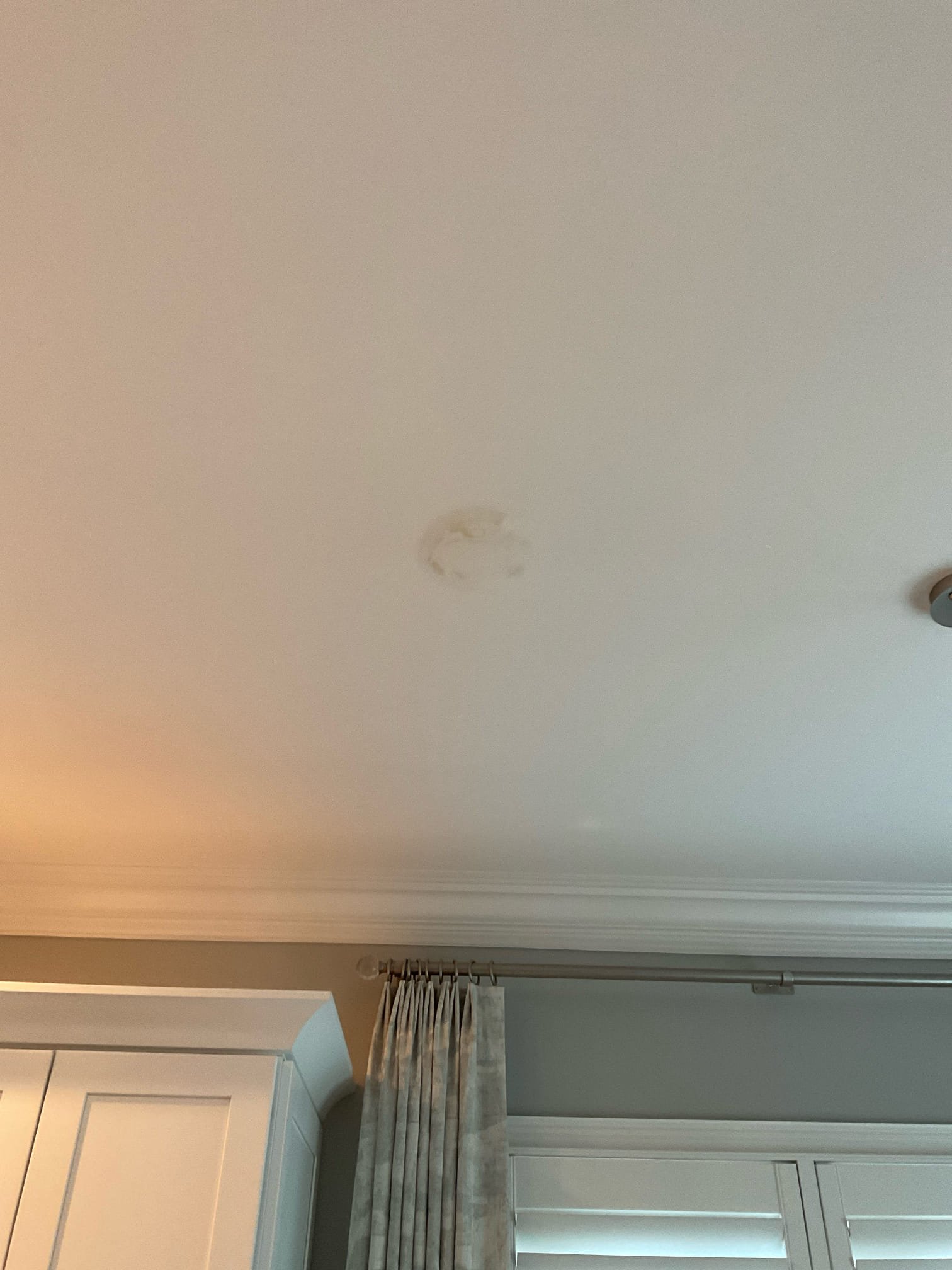 Stain in kitchen ceiling , opened ceiling checked found problem is leaking from tile shower pan , not plumbing pipe , told customer to call tile contractor to fix this problem. 