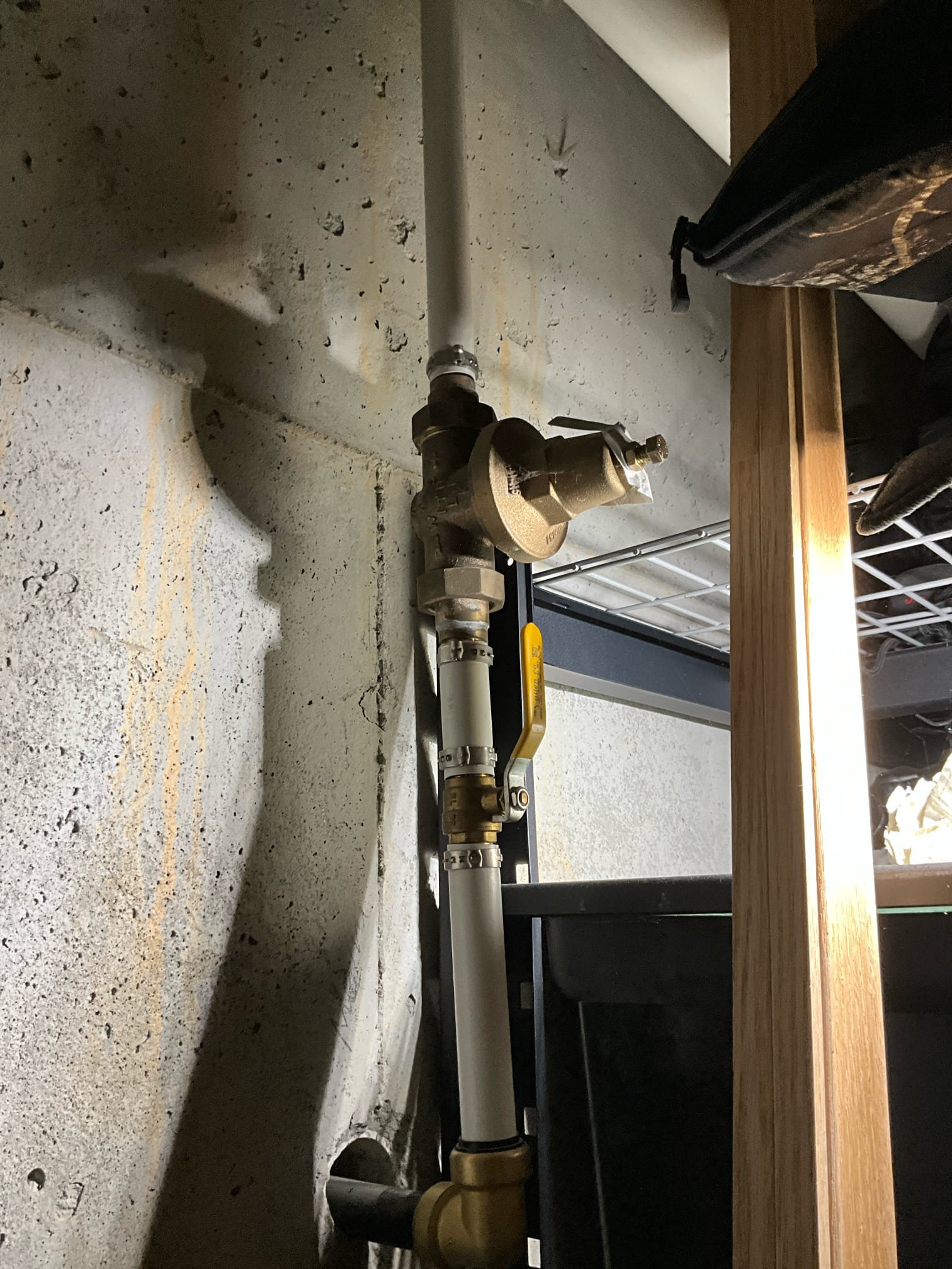 Call for sewer backup in master bathroom.

Arrived and met with Jenny and Joe. Jenny states that yesterday they hired a gouging or gurgling sound near the master bathroom, and then a sudden noise that sounded like water gushing through the walls. She said this has happened once before about a year ago. 

Inspection findings: 
History: We have resealed a sewage ejection pump in the basement years ago. Two months ago a sewer spot repair made on main line under porch. History of backup in master group a year ago, and a self resolved backup yesterday. Customers are original owners of home. House is on city sewer. I didn’t find clean out, but Joe said there is one buried in the front, and manhole is in front of house.

Upstairs has three bathrooms. The master, laundry, and Jack and Jill all appear to be on one line down, which the kitchen ties in to on the main floor. Daughter bathroom upstairs is on the opposite side of the house, and is on a. Line that likely serves the powder room and pl