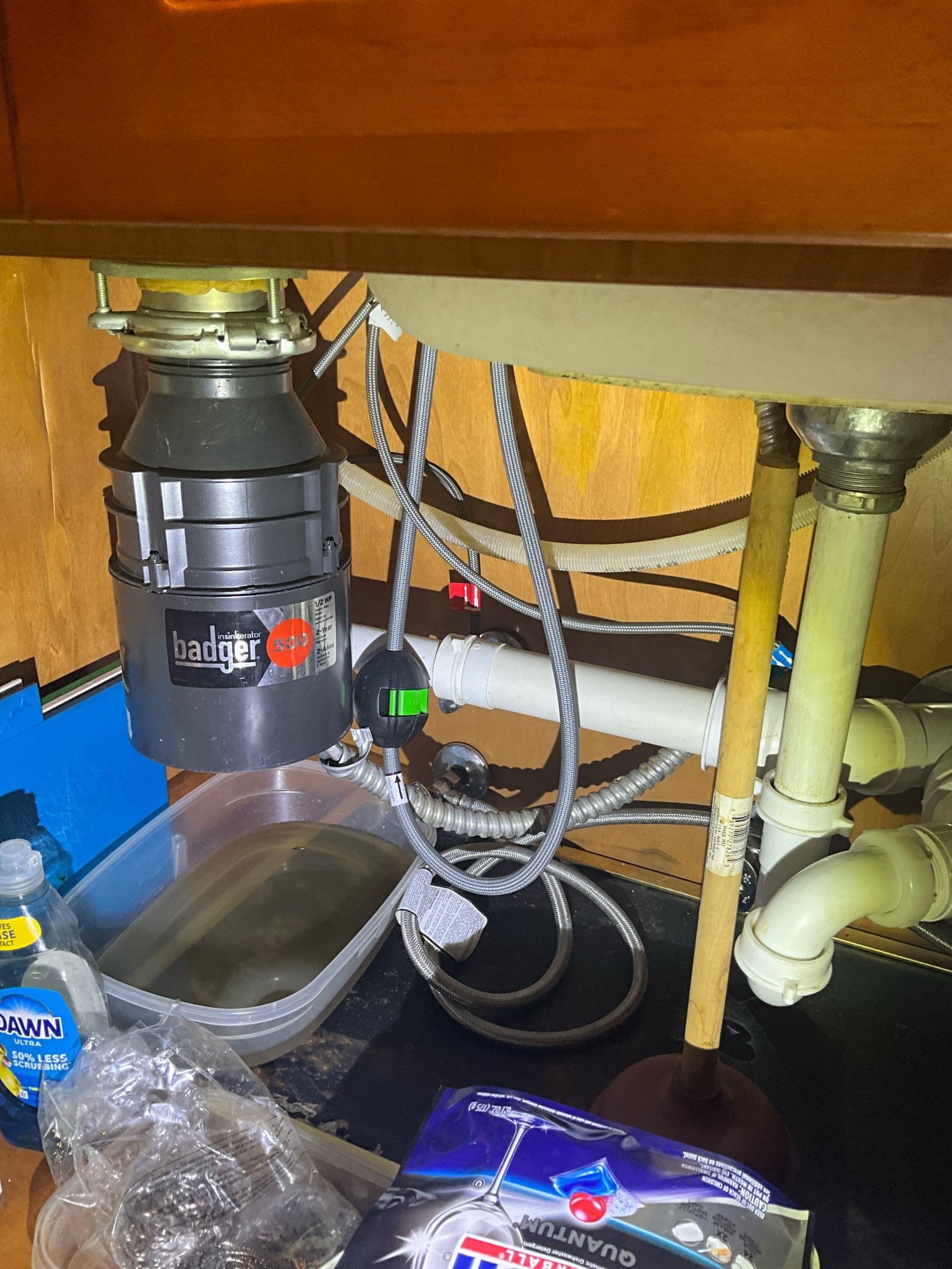 Customer had a garbage disposal that was leaking and jammed. Attempted to check house pressure but didn’t have access to the boiler drain at the water heater so the pressure couldn’t be safely checked. The water heater is only a few years old and it looks like the PRV was replaced around the same time. Replaced the leaking disposal and tested all work to ensure proper function and no leaks. None were found. Customer had water around base of kitchen faucet. Saw no obvious leaking when testing, but could potentially be a secondary leak present. 