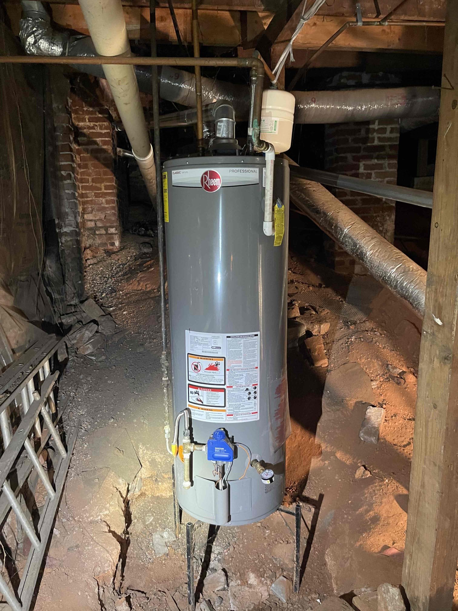 Water heater was able to be lit. Did not notice anything actively leaking. Vent was drafting correctly. Vent is ran into a chimney chase which is against code without having a liner installed by a licensed hvac company. Left quote to replace the water heater as it is 12 years old. Customer is considering doing a tankless water heater instead and wants to do some more research before she decides since the water heater is still working. 